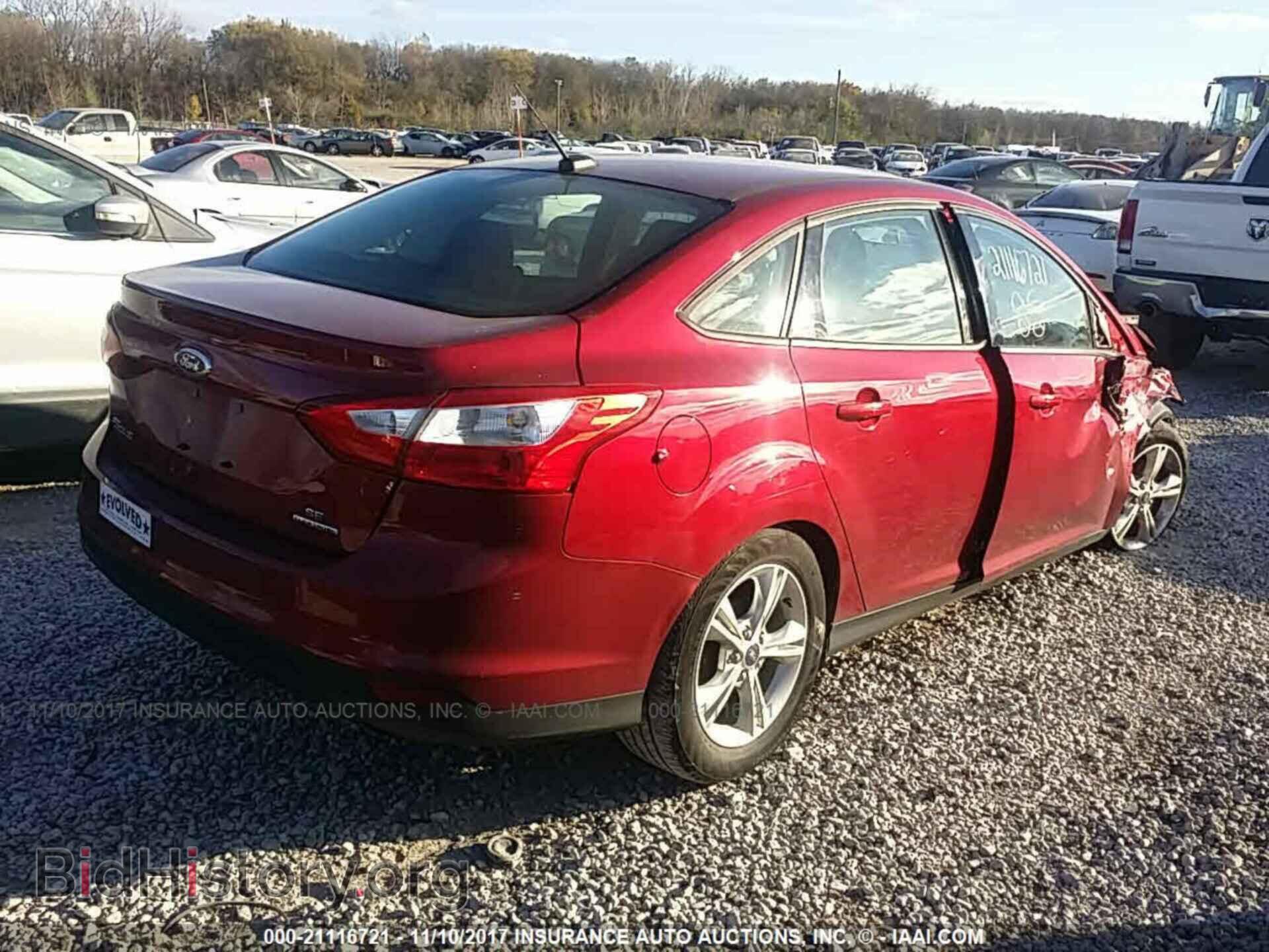 2014 Ford Focus - VIN: 1FADP3F20EL206504 - Фото 4