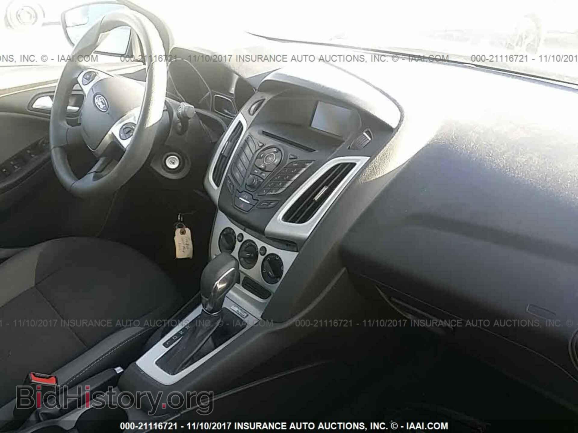 2014 Ford Focus - VIN: 1FADP3F20EL206504 - Фото 5