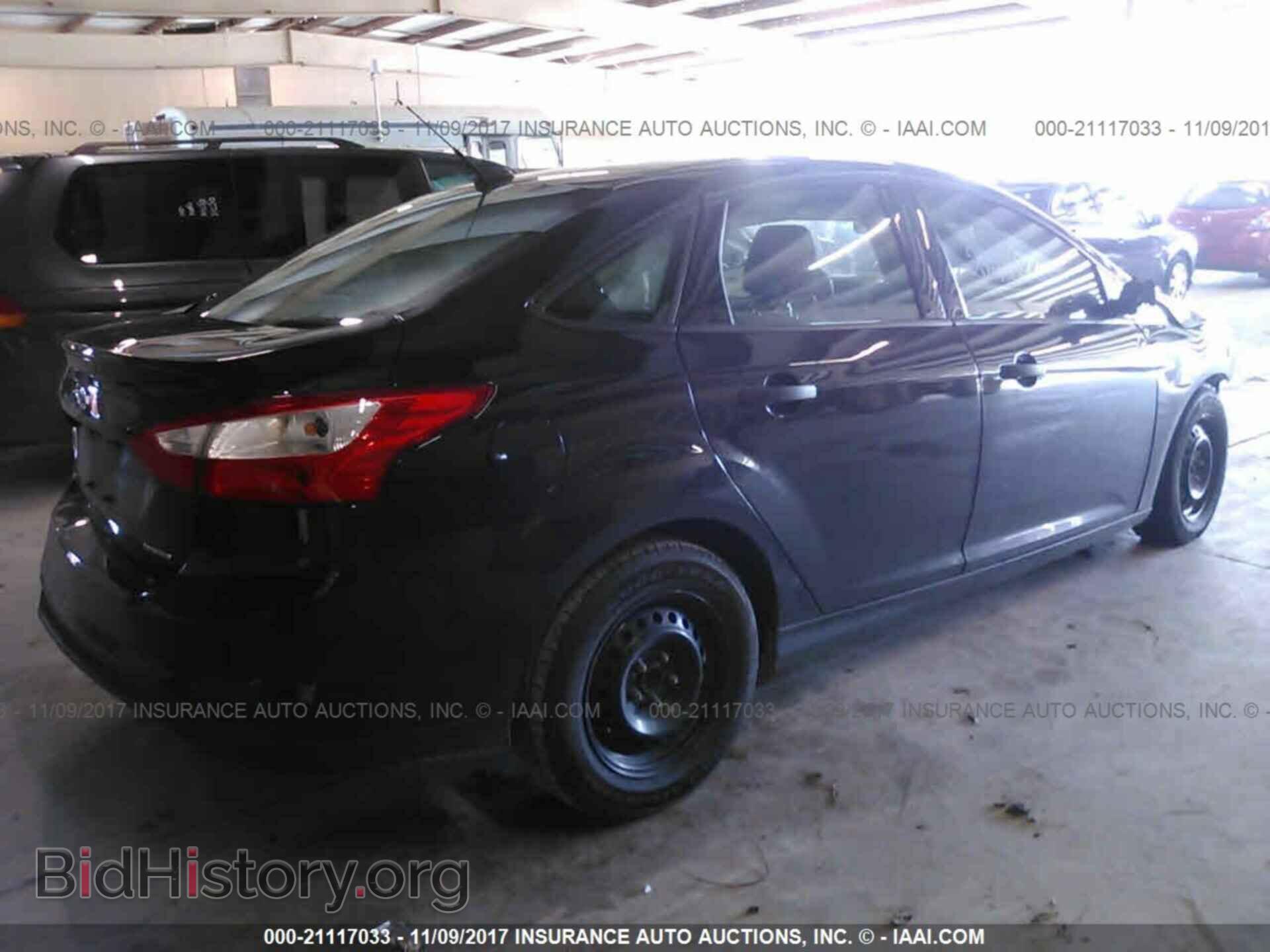 2014 Ford Focus - VIN: 1FADP3E24EL345391 - Photo 4