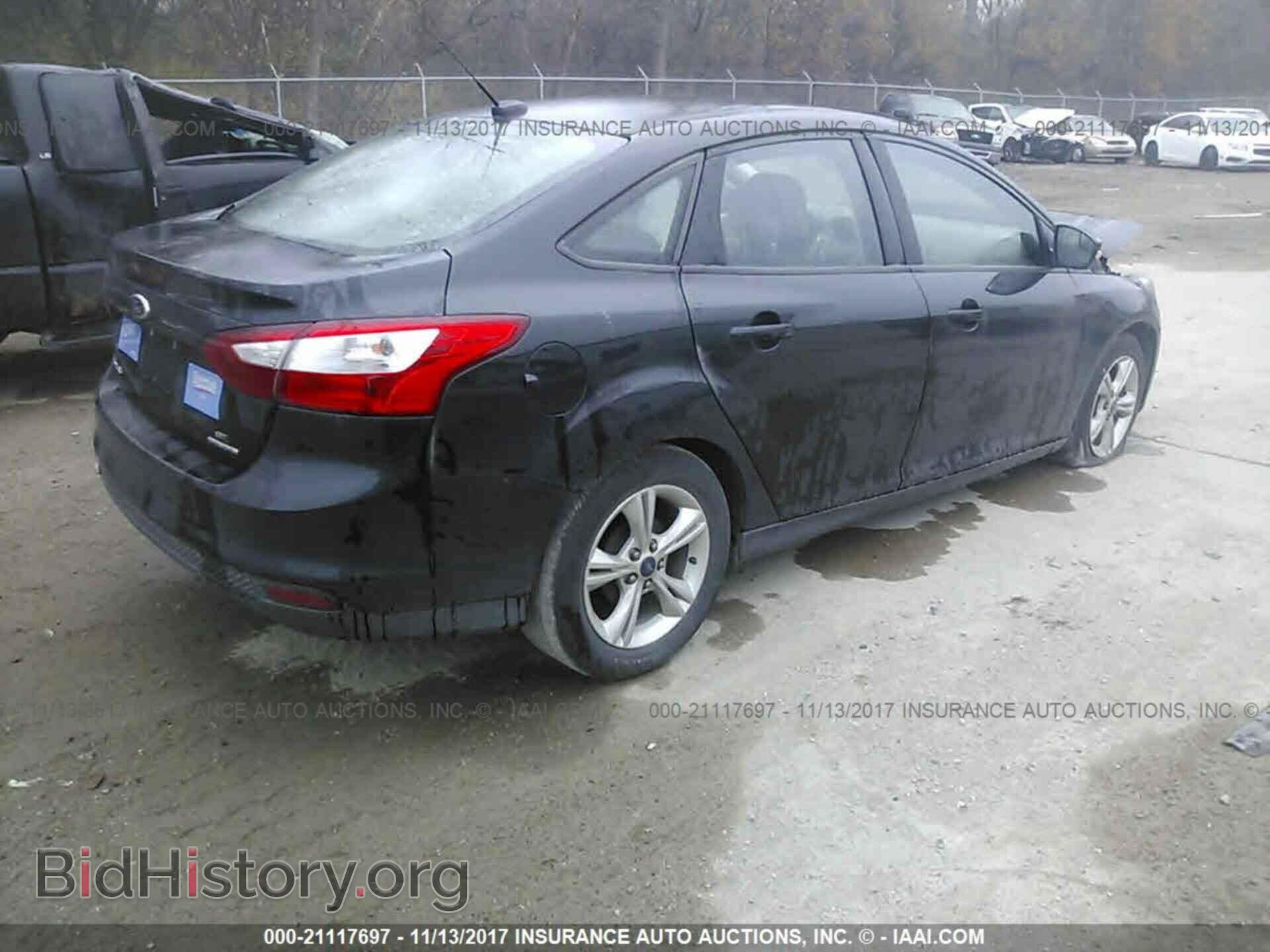 2014 Ford Focus - VIN: 1FADP3F2XEL234715 - Photo 4