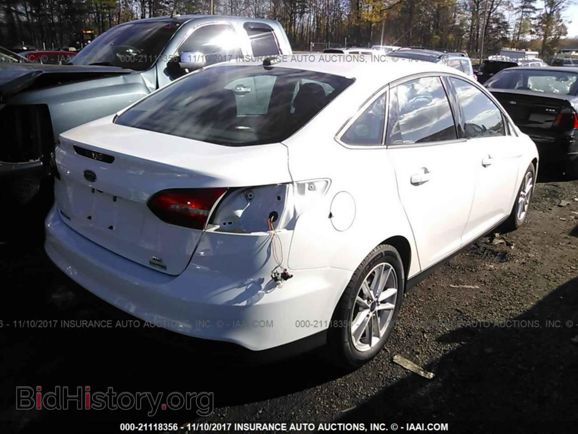2015 Ford Focus - VIN: 1FADP3FEXFL322935 - Photo 4