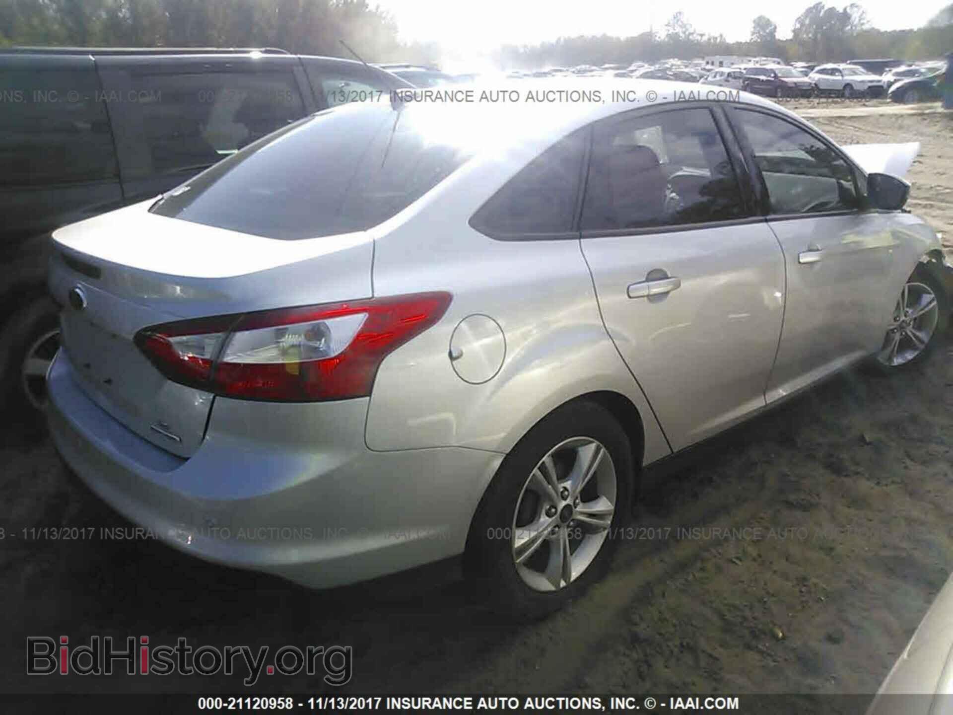 2014 Ford Focus - VIN: 1FADP3F27EL410412 - Фото 4