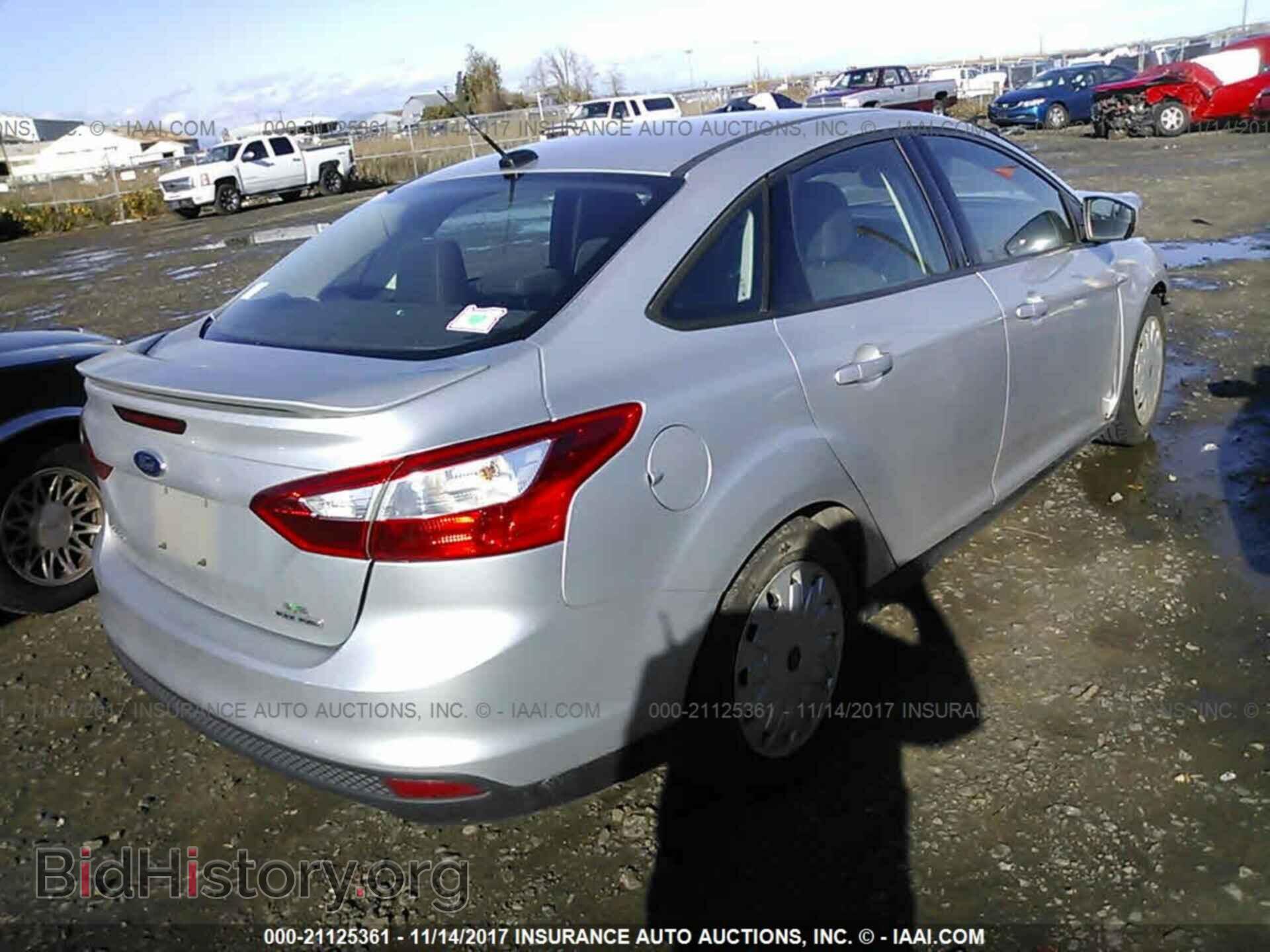 2014 Ford Focus - VIN: 1FADP3F22EL157113 - Фото 4
