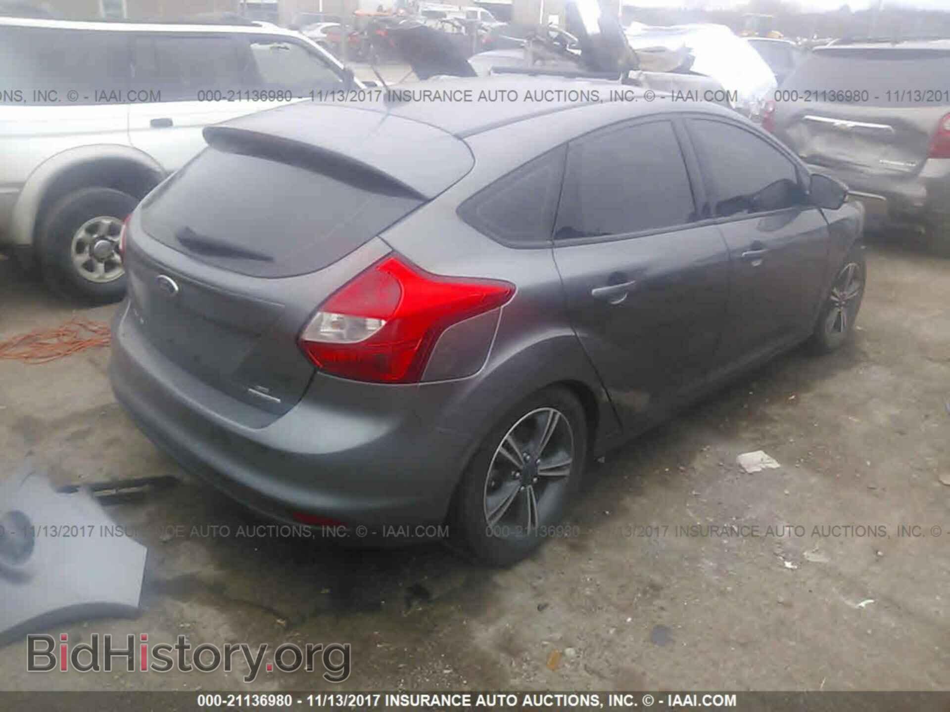 2014 Ford Focus - VIN: 1FADP3K29EL422244 - Фото 4