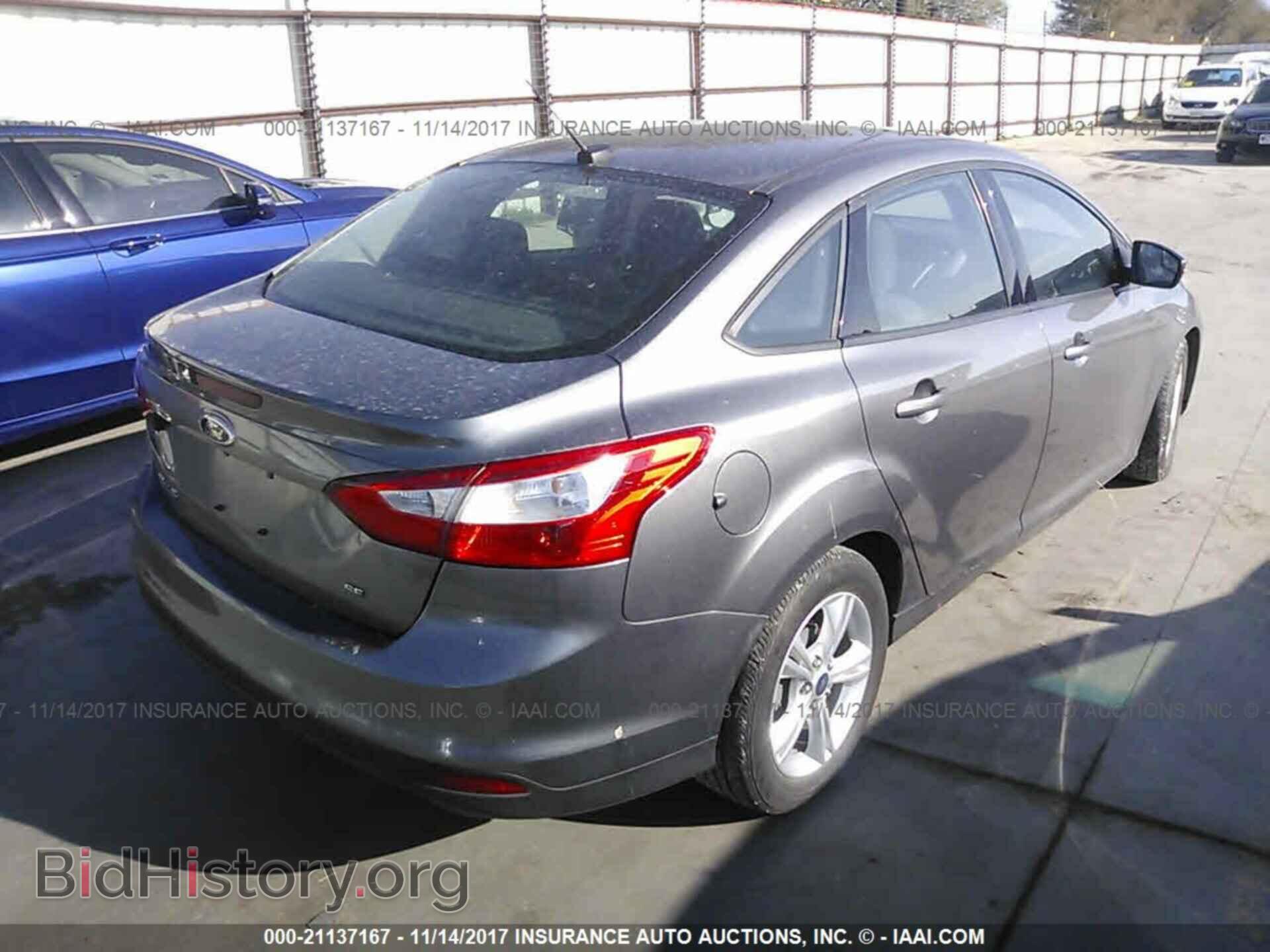 2014 Ford Focus - VIN: 1FADP3F21EL208407 - Photo 4