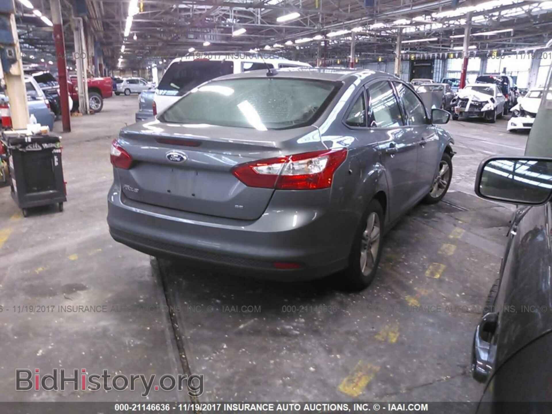 2014 Ford Focus - VIN: 1FADP3F22EL433242 - Photo 4