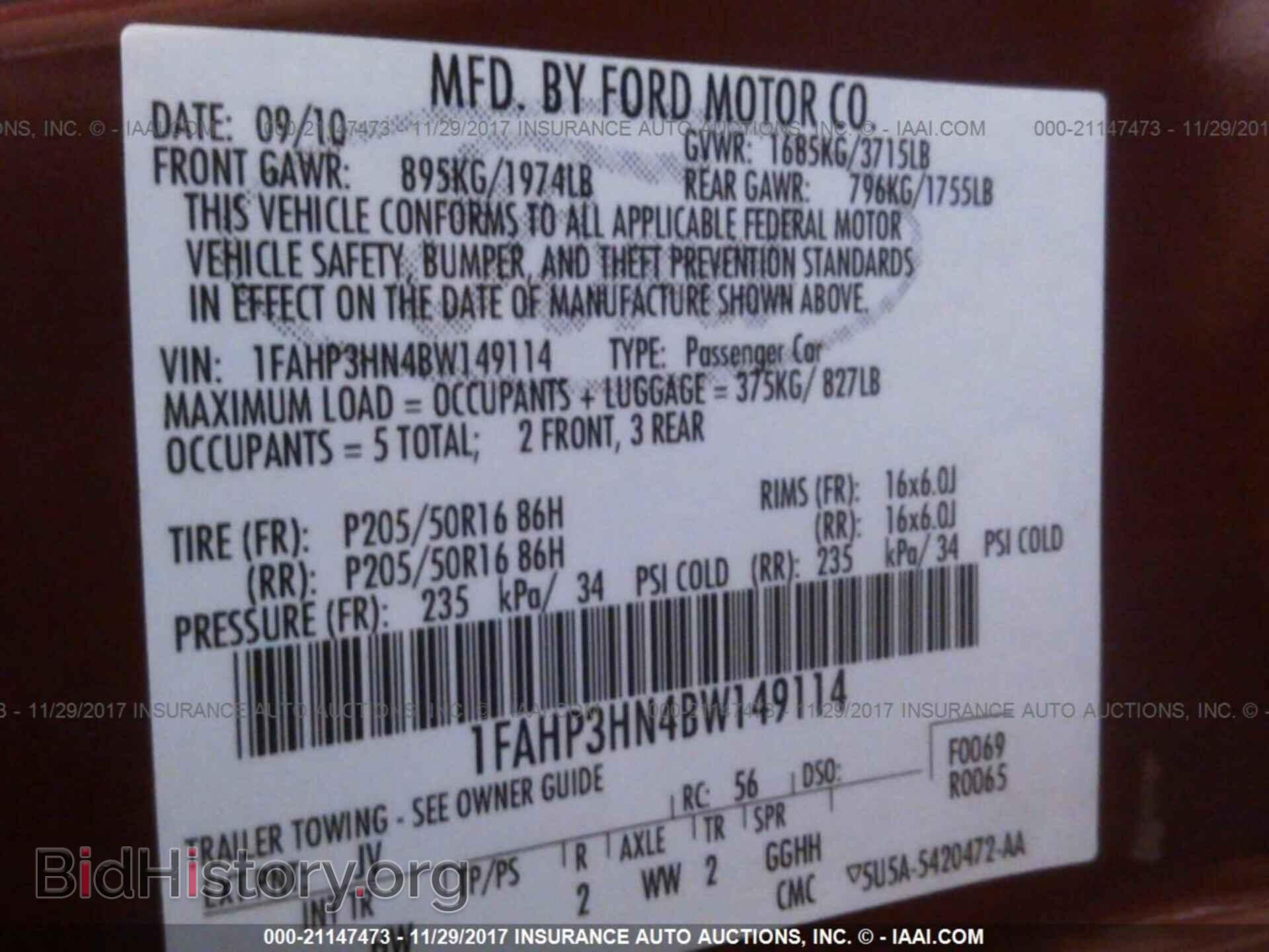 2011 Ford Focus - VIN: 1FAHP3HN4BW149114 - Фото 9