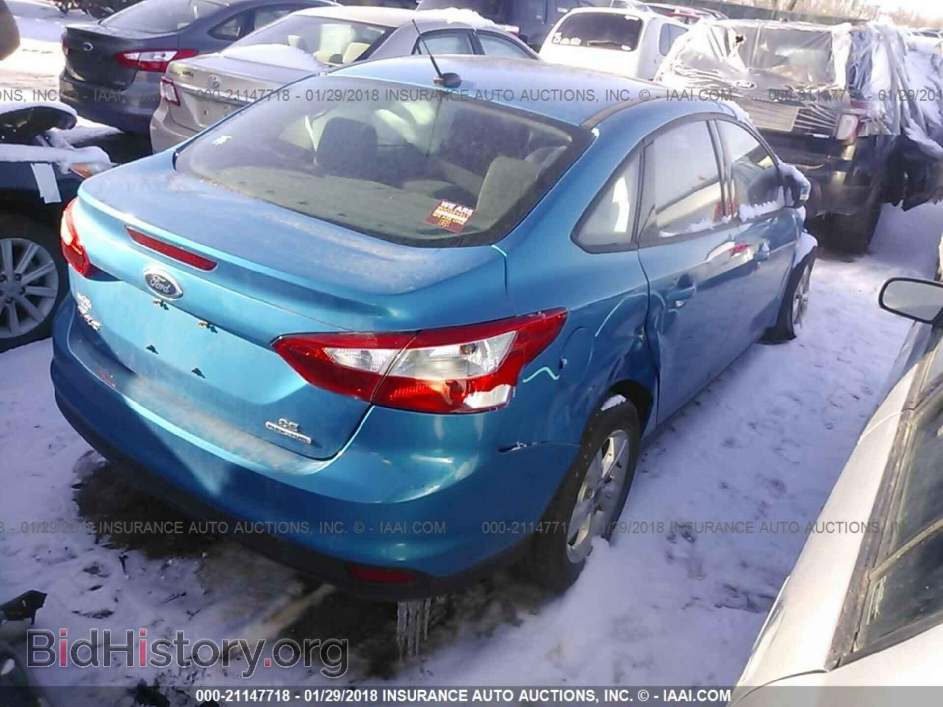 2013 Ford Focus - VIN: 1FADP3F2XDL313543 - Photo 4