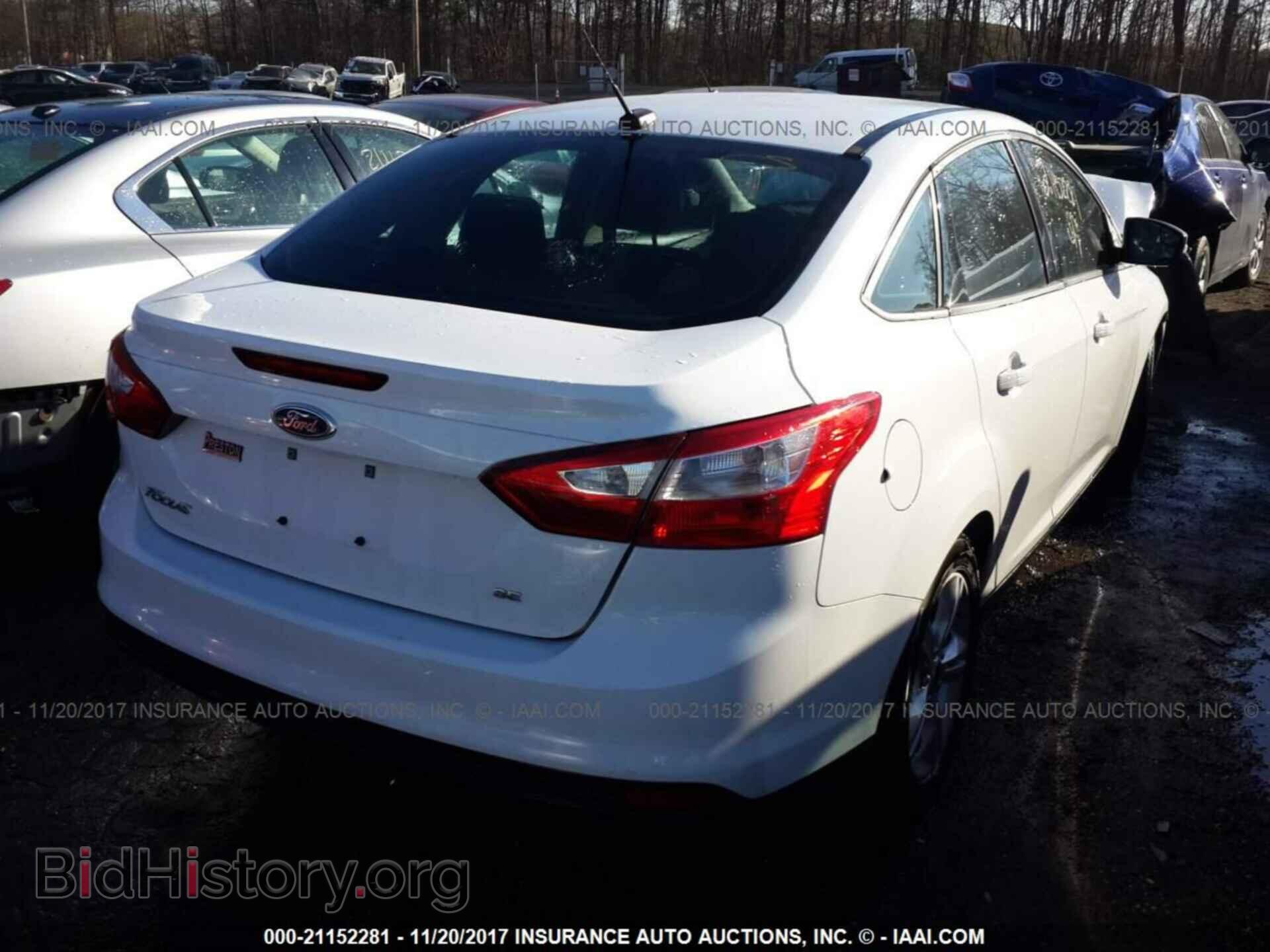 2014 Ford Focus - VIN: 1FADP3F26EL173475 - Фото 4