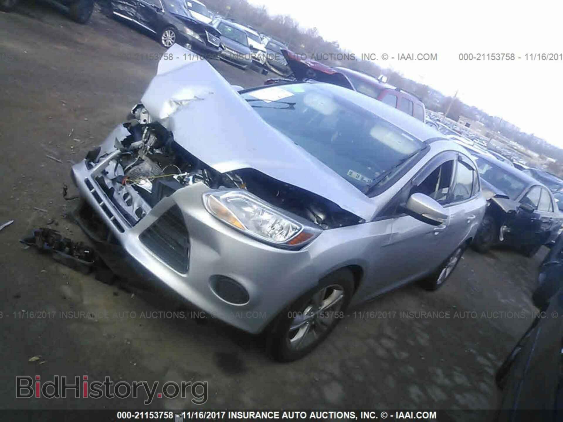 2014 Ford Focus - VIN: 1FADP3F21EL124538 - Фото 2