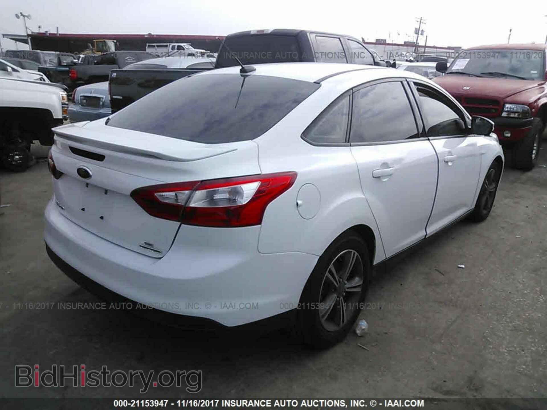 2014 Ford Focus - VIN: 1FADP3F22EL451210 - Photo 4