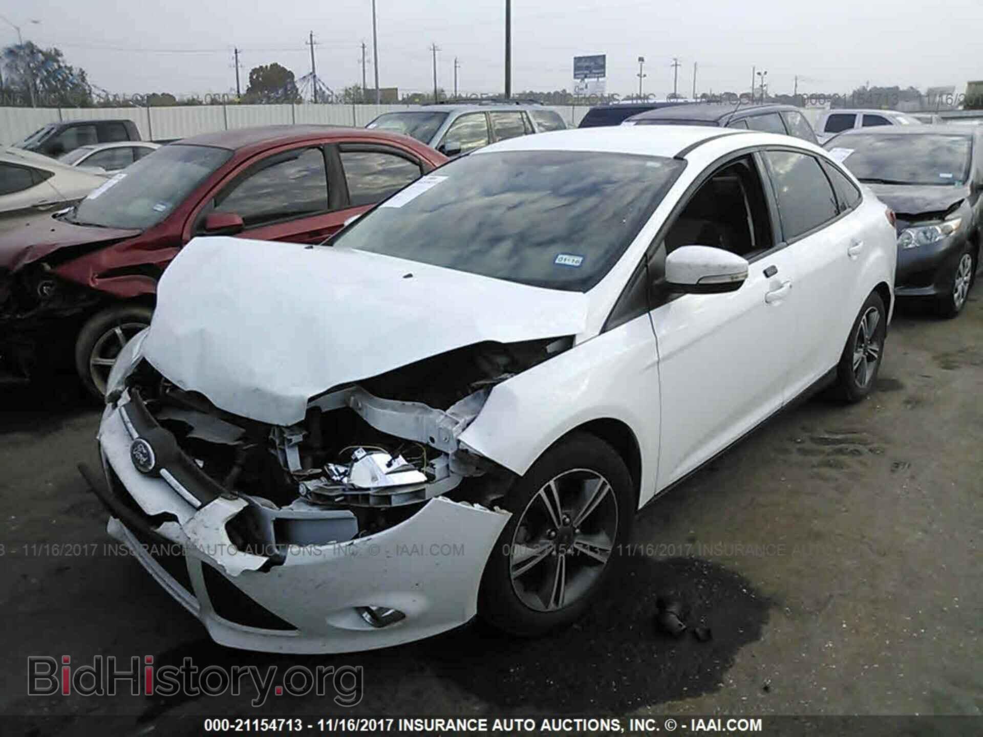 2014 Ford Focus - VIN: 1FADP3F23EL372595 - Photo 2