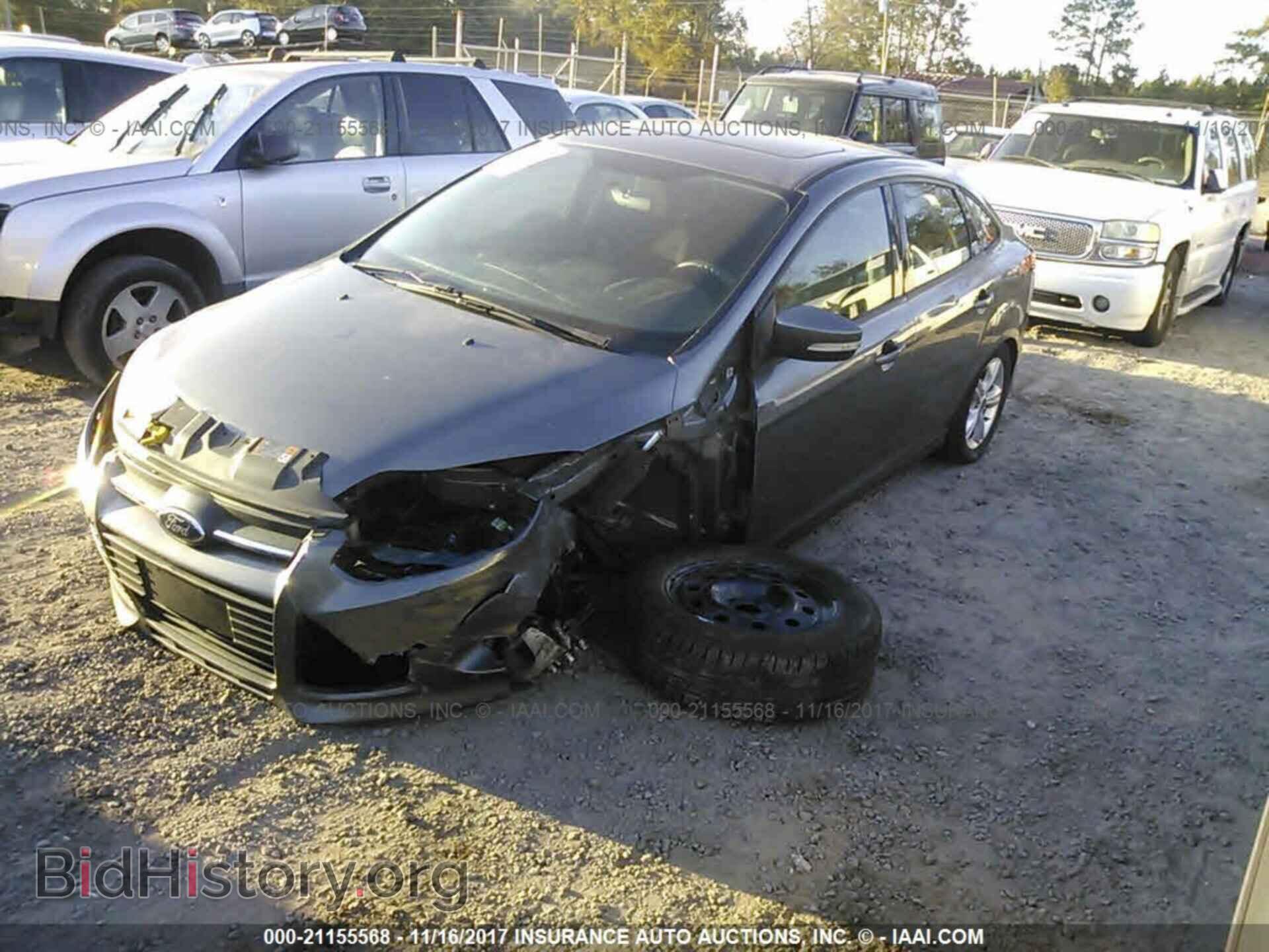 2014 Ford Focus - VIN: 1FADP3F27EL315929 - Фото 2