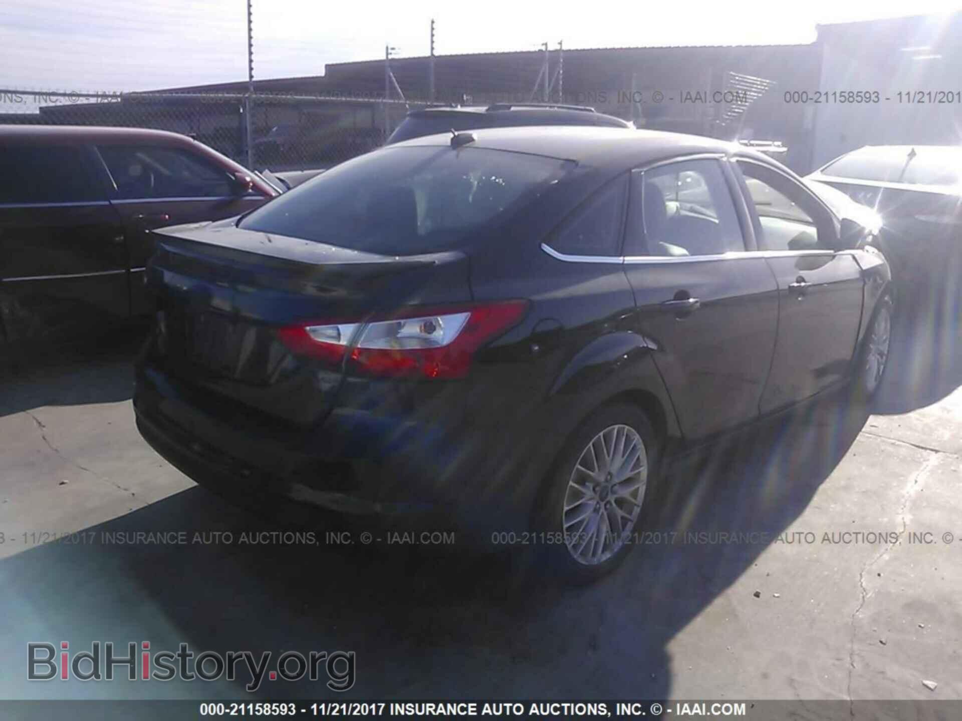 2014 Ford Focus - VIN: 1FADP3J22EL460593 - Фото 4