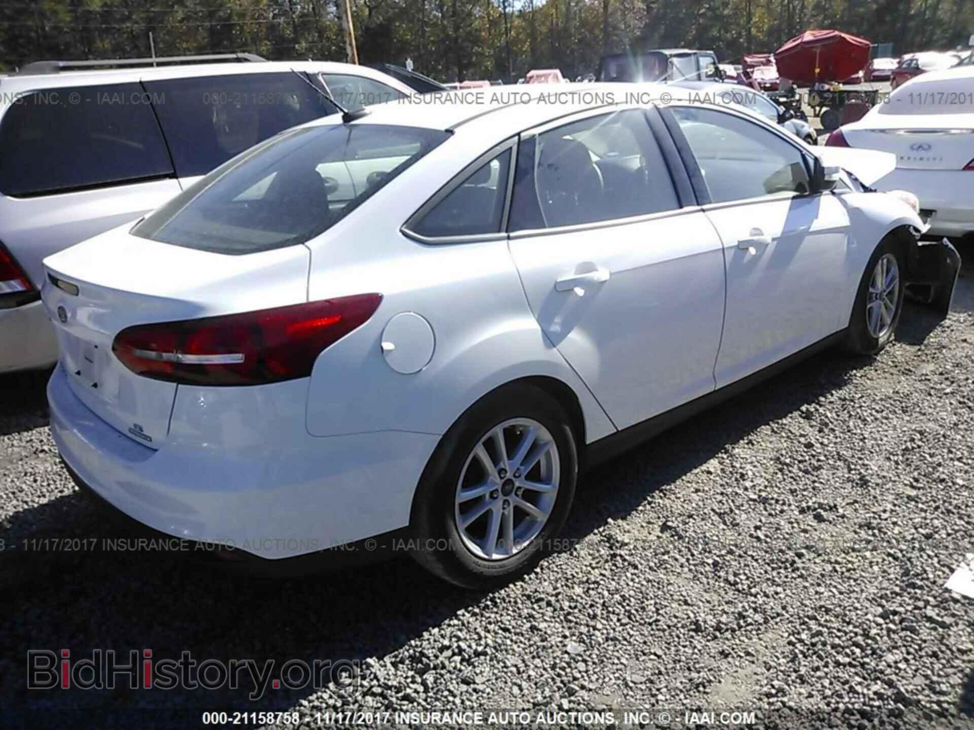 2015 Ford Focus - VIN: 1FADP3F24FL244092 - Photo 4