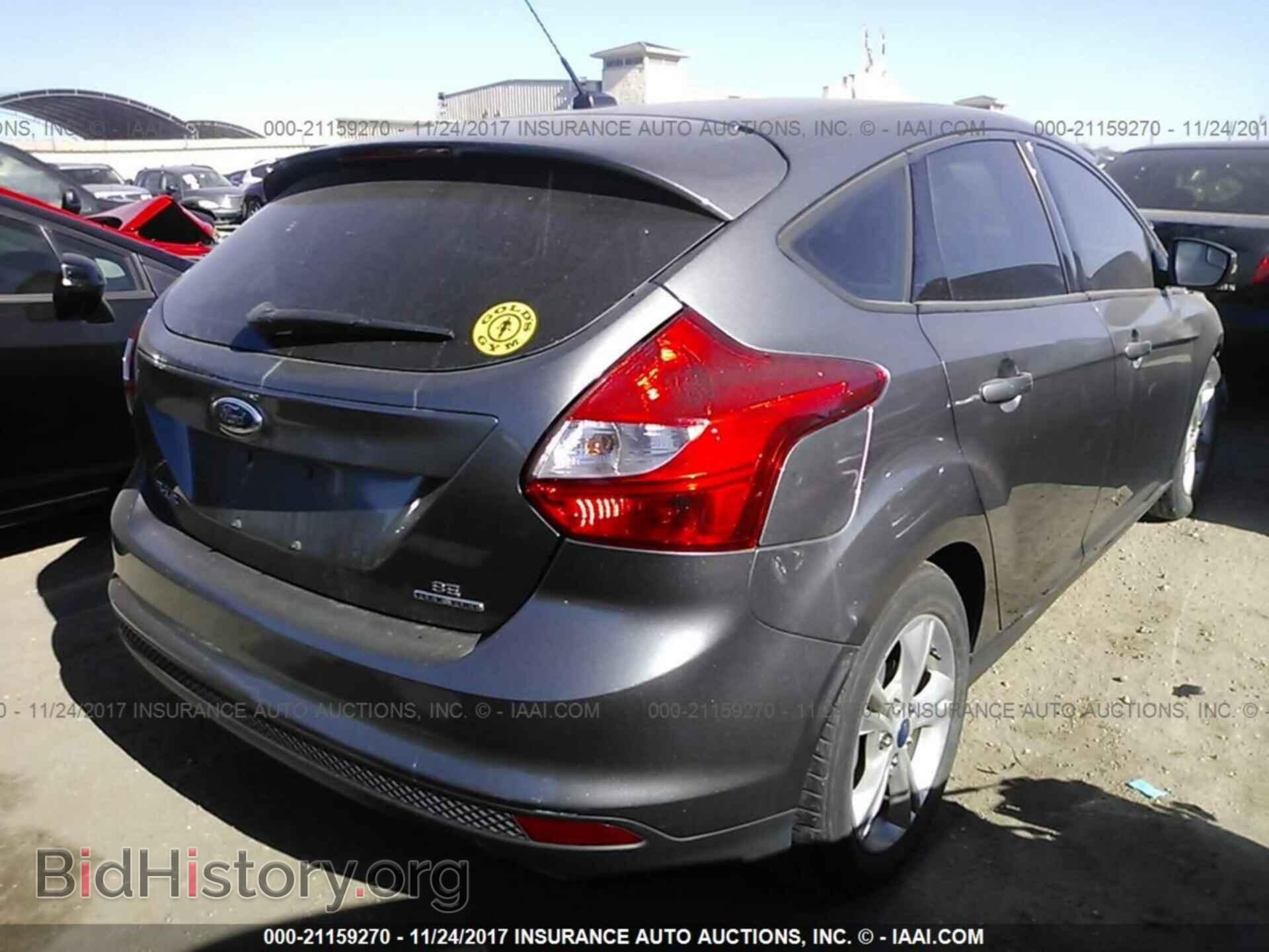 2014 Ford Focus - VIN: 1FADP3K22EL293554 - Фото 4