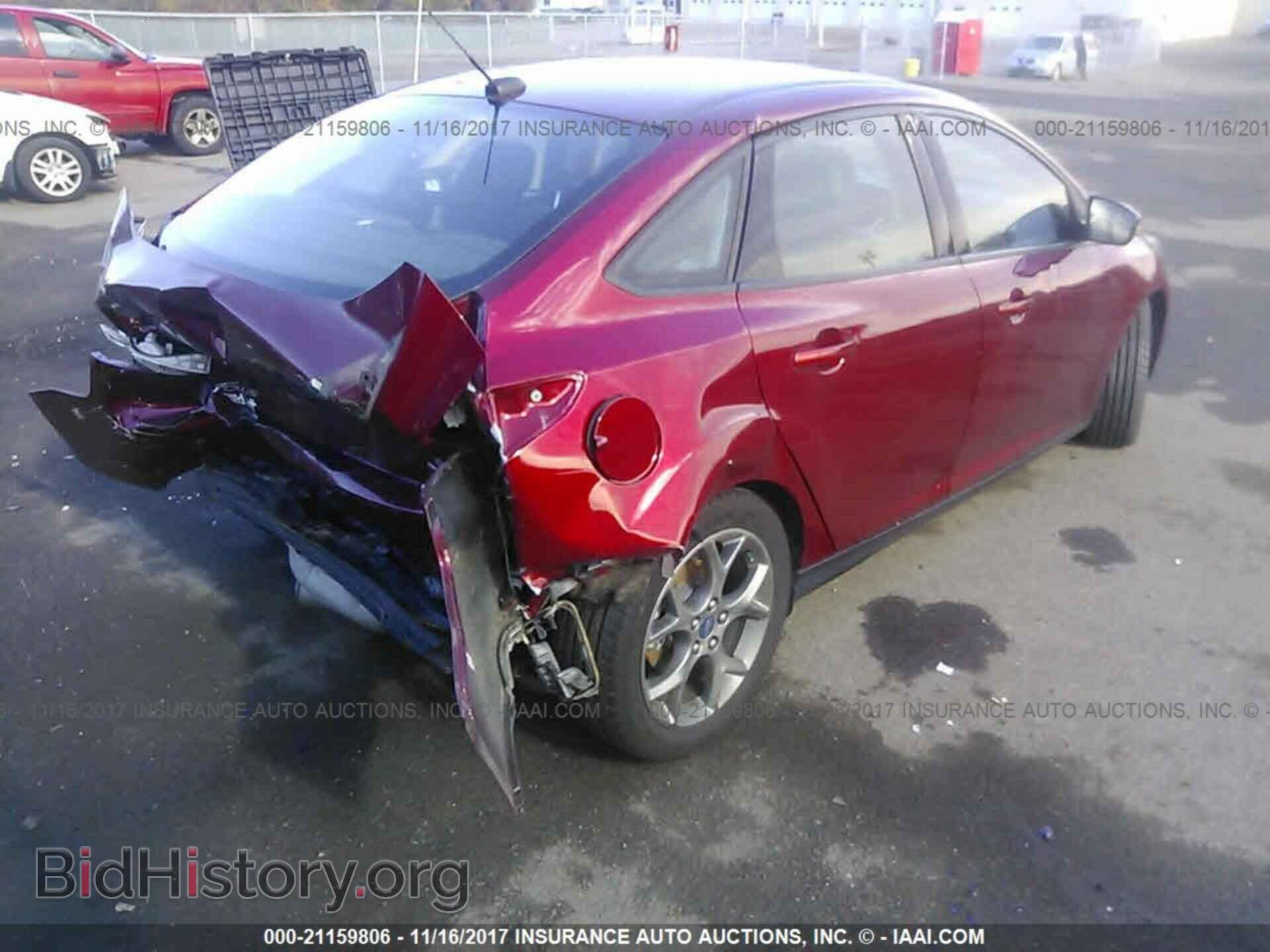 2014 Ford Focus - VIN: 1FADP3F21EL142330 - Photo 4