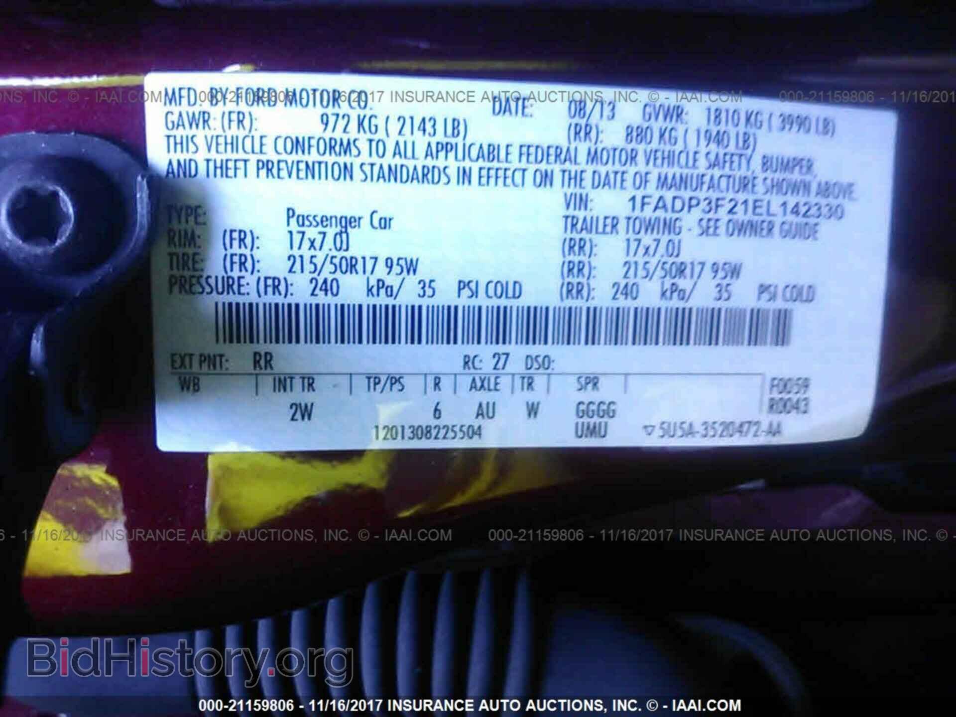 2014 Ford Focus - VIN: 1FADP3F21EL142330 - Photo 9