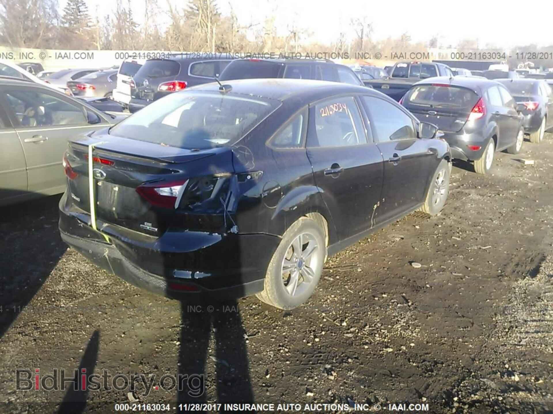 2014 Ford Focus - VIN: 1FADP3F23EL293265 - Photo 4