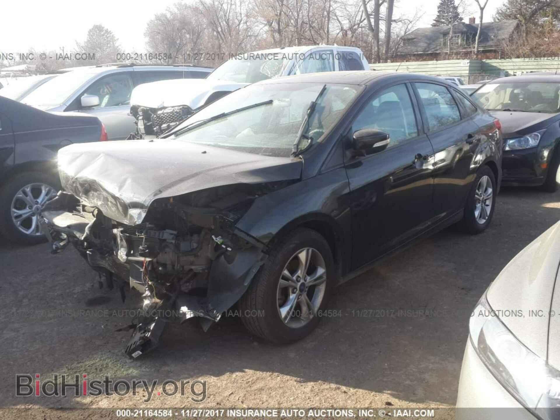 2014 Ford Focus - VIN: 1FADP3F26EL207558 - Photo 2