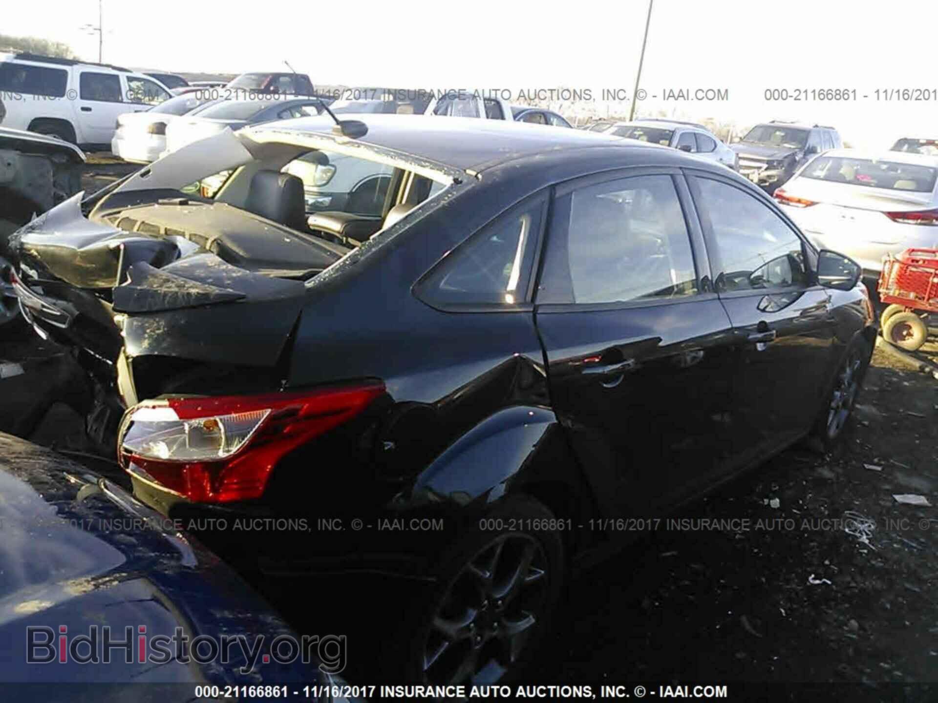 2013 Ford Focus - VIN: 1FADP3F28DL106228 - Фото 4