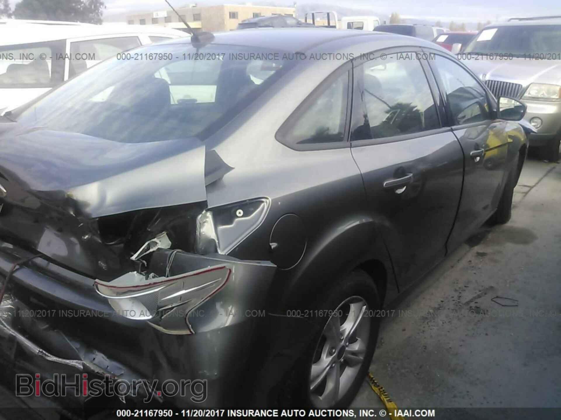 2014 Ford Focus - VIN: 1FADP3F27EL407848 - Photo 4