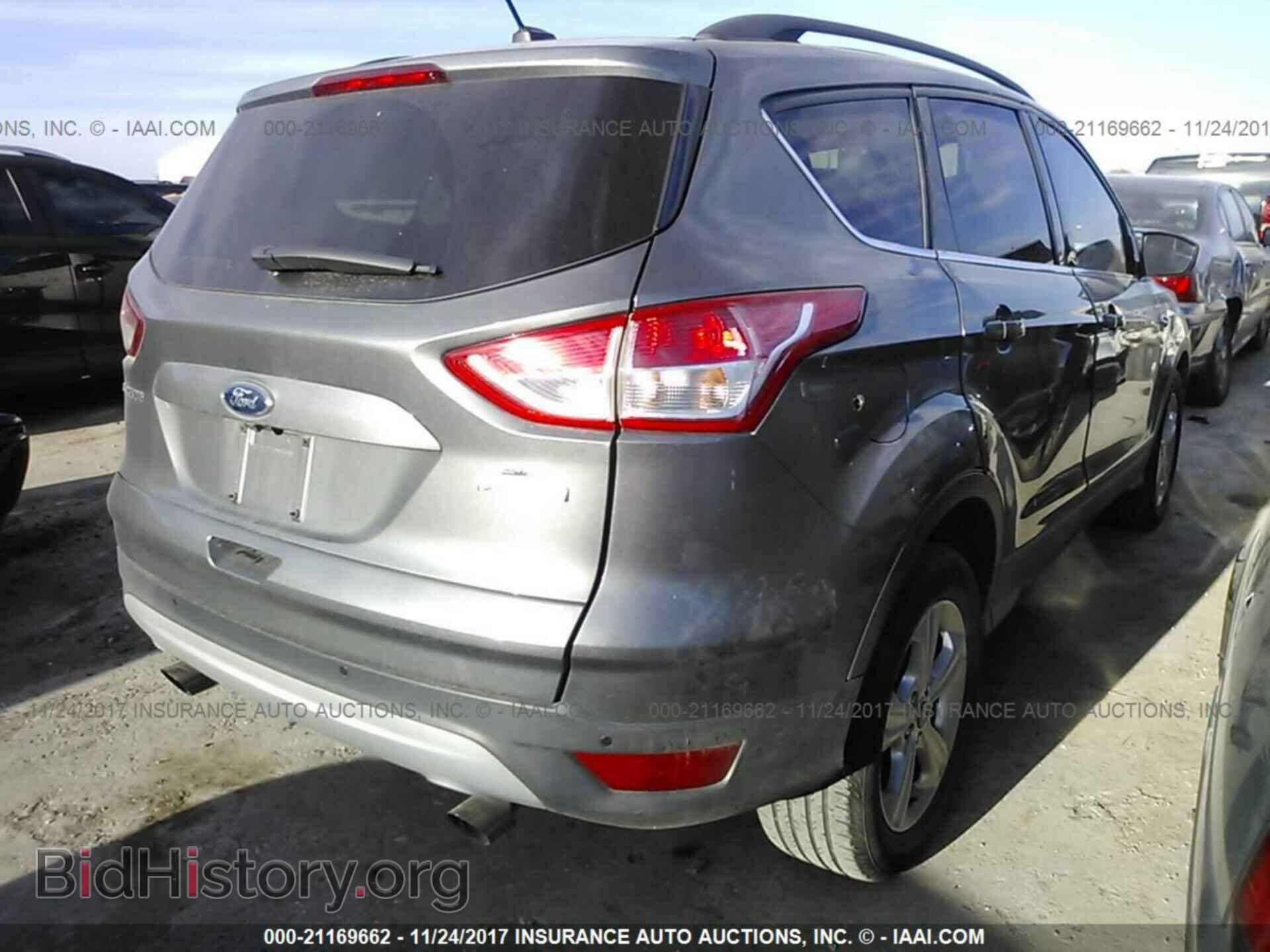 2014 Ford Escape - VIN: 1FMCU0GX4EUE51612 - Photo 4