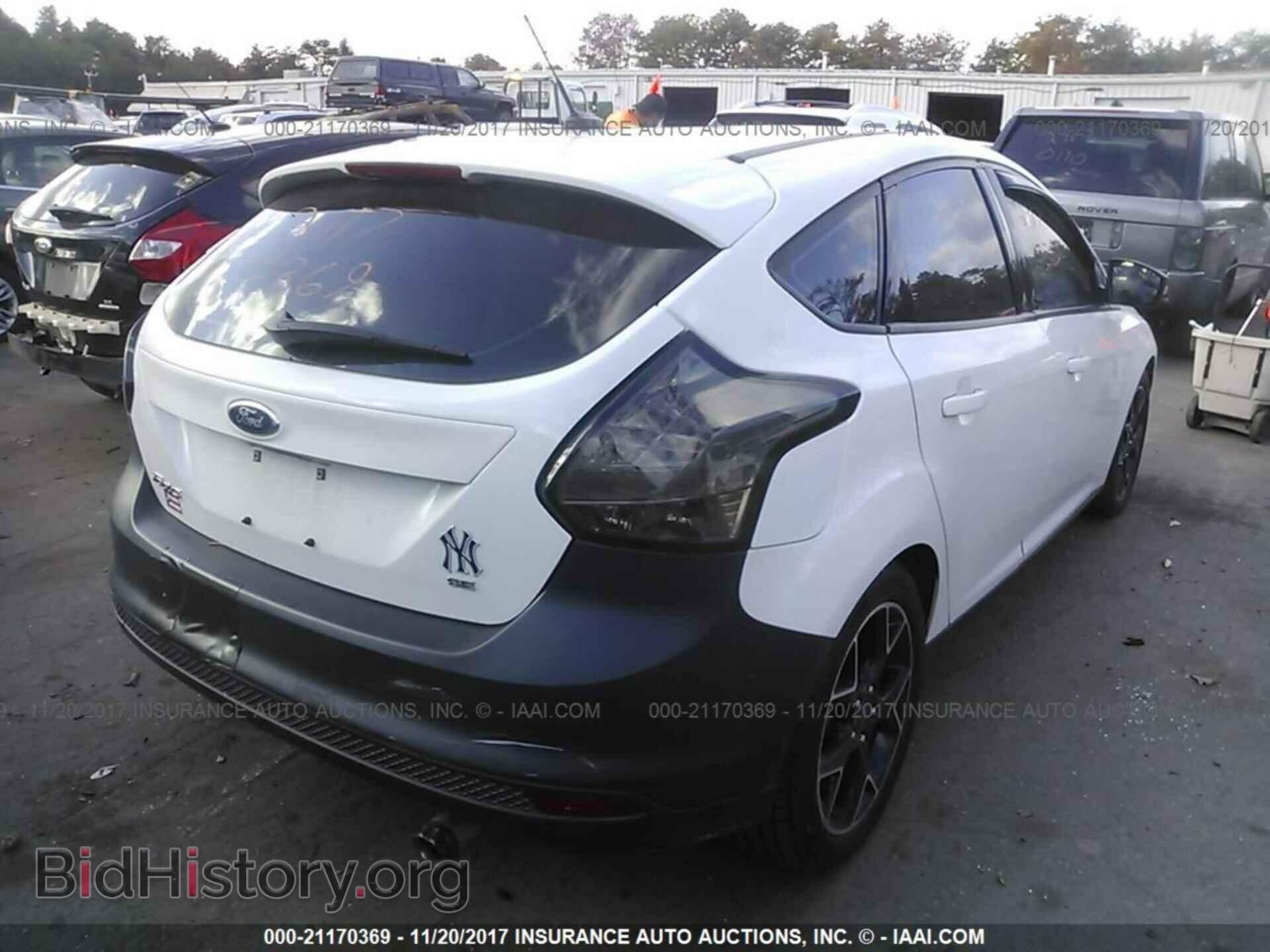 2014 Ford Focus - VIN: 1FADP3K27EL297583 - Photo 4