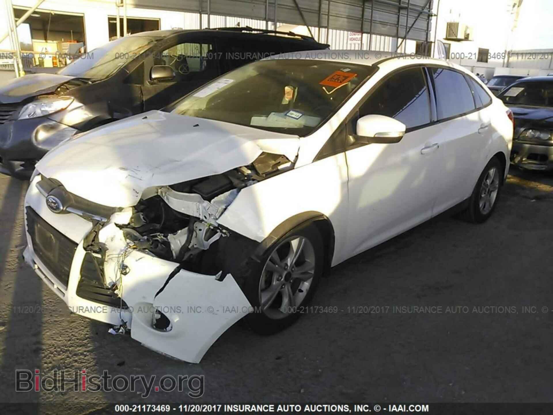 2014 Ford Focus - VIN: 1FADP3F2XEL372450 - Фото 2