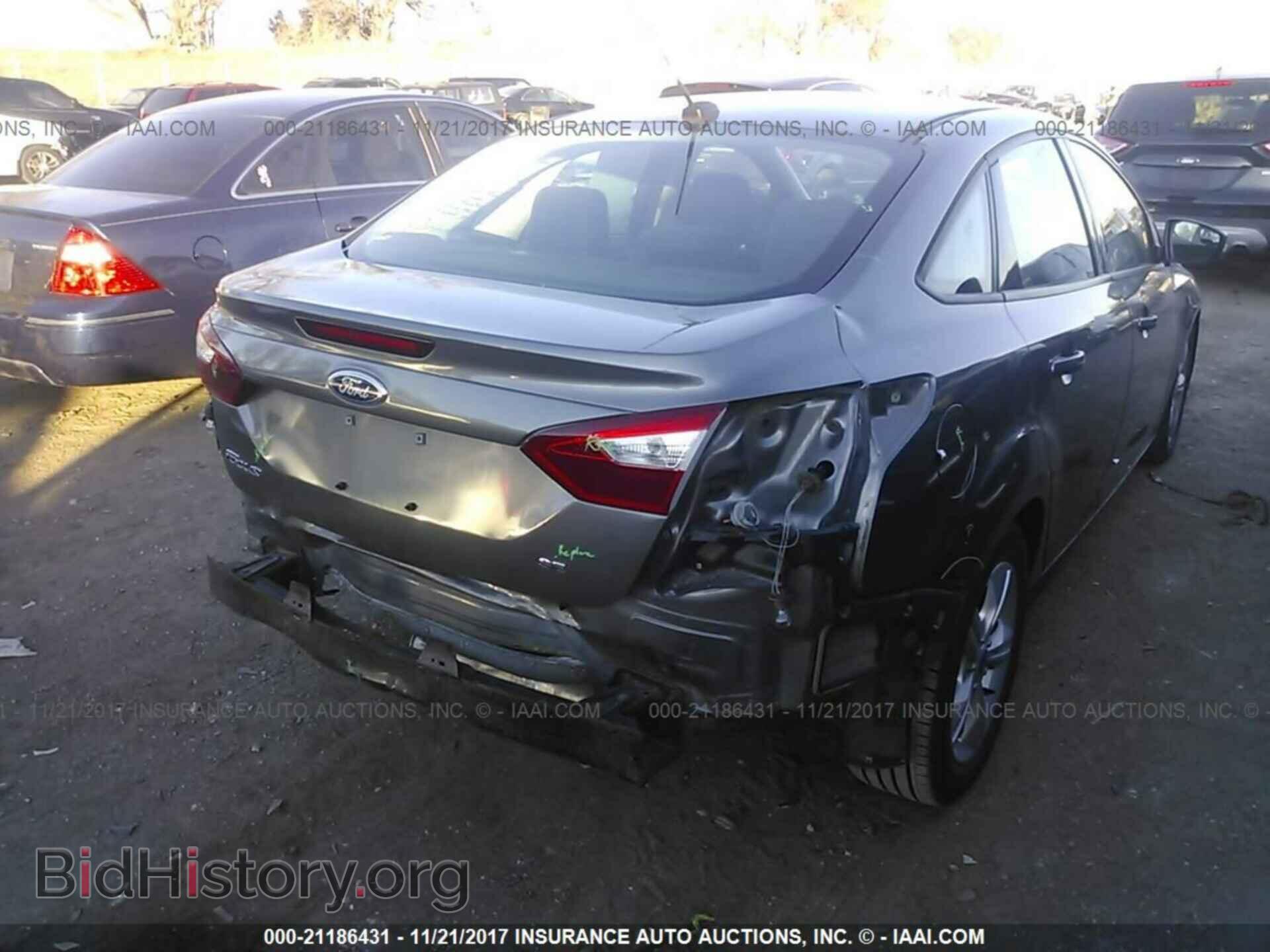 2014 Ford Focus - VIN: 1FADP3F29EL102058 - Фото 6