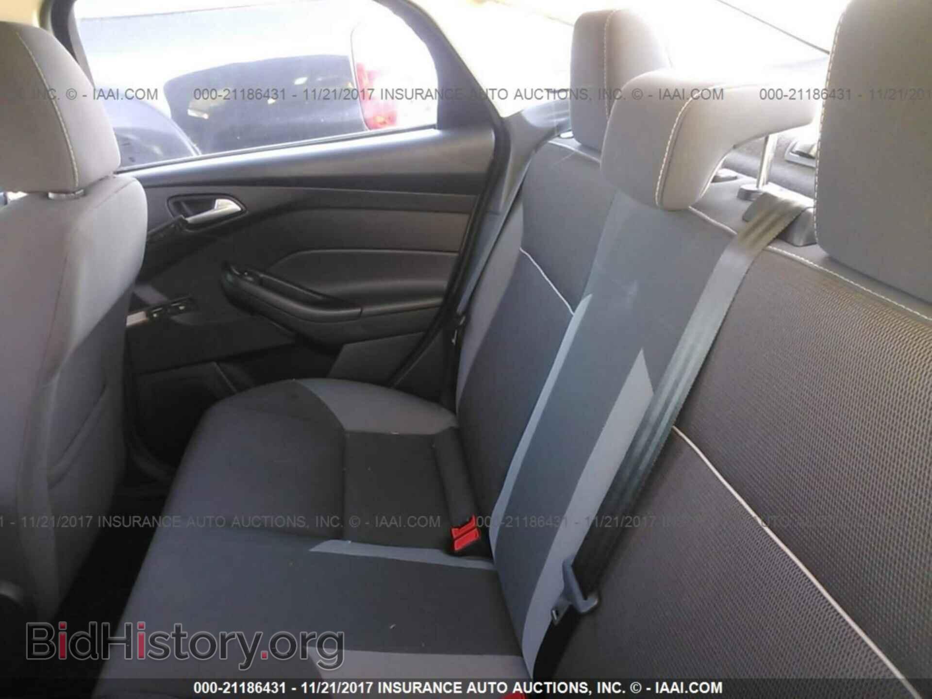 2014 Ford Focus - VIN: 1FADP3F29EL102058 - Фото 8