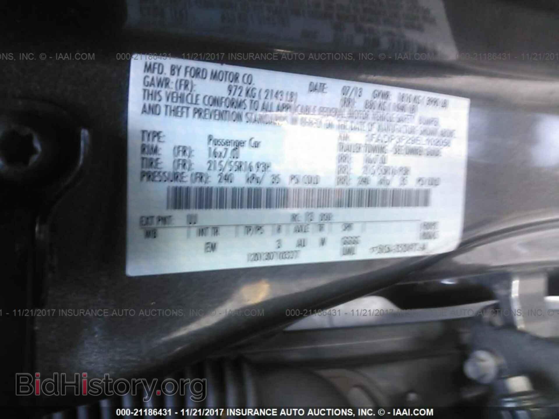 2014 Ford Focus - VIN: 1FADP3F29EL102058 - Фото 9
