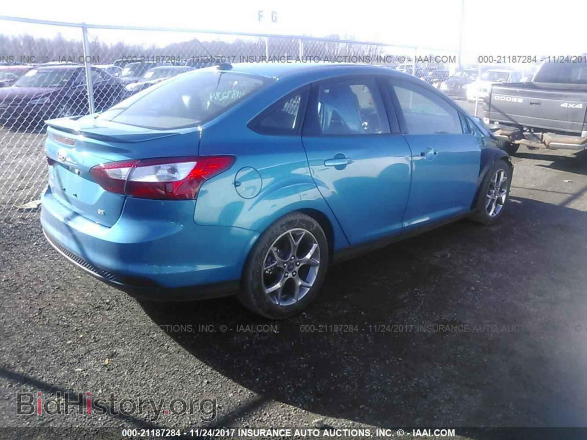 2014 Ford Focus - VIN: 1FADP3F28EL379980 - Photo 4
