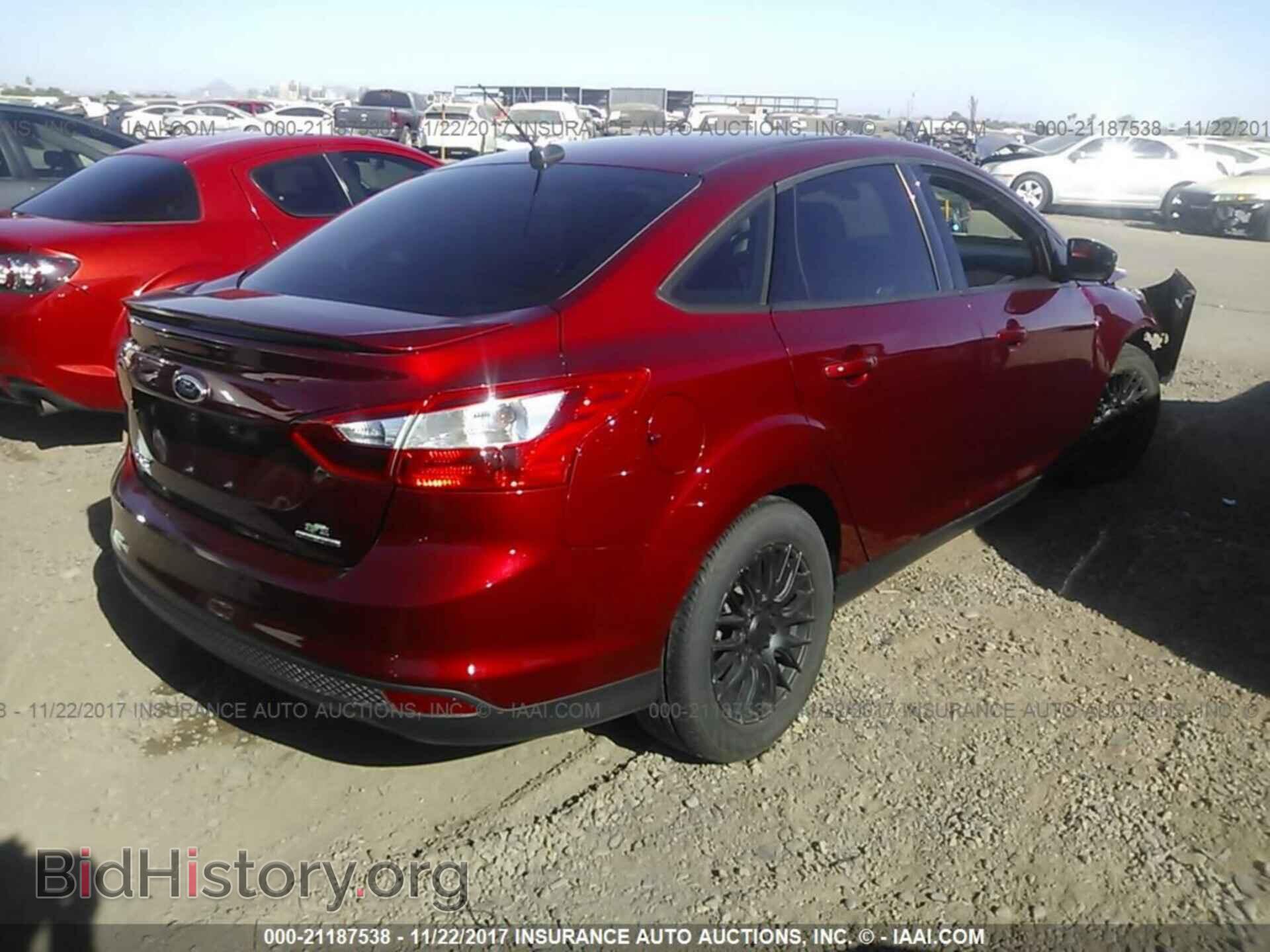 2014 Ford Focus - VIN: 1FADP3F24EL169845 - Photo 4