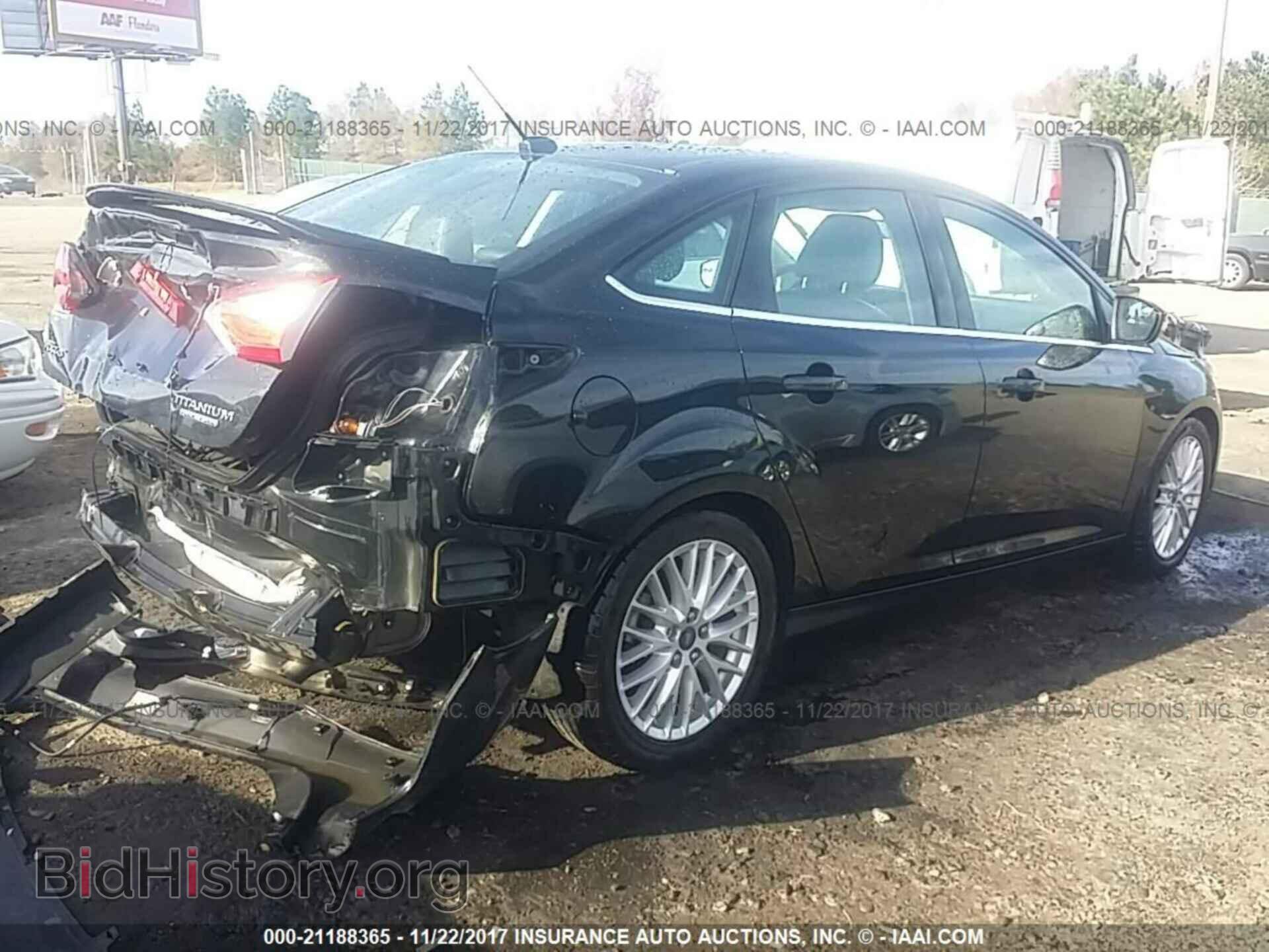2014 Ford Focus - VIN: 1FADP3J2XEL227321 - Photo 4