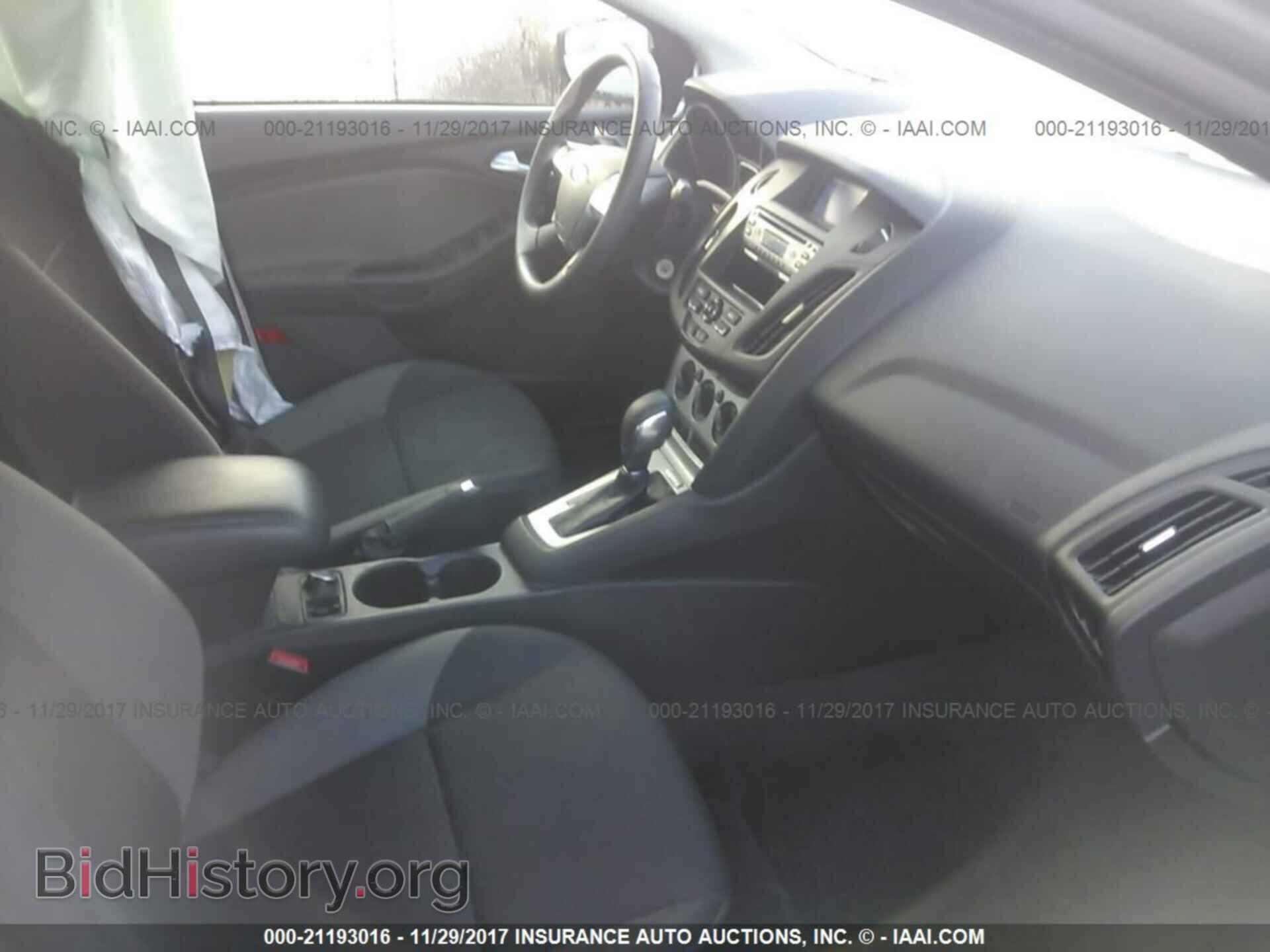 2014 Ford Focus - VIN: 1FADP3F28EL322842 - Фото 5