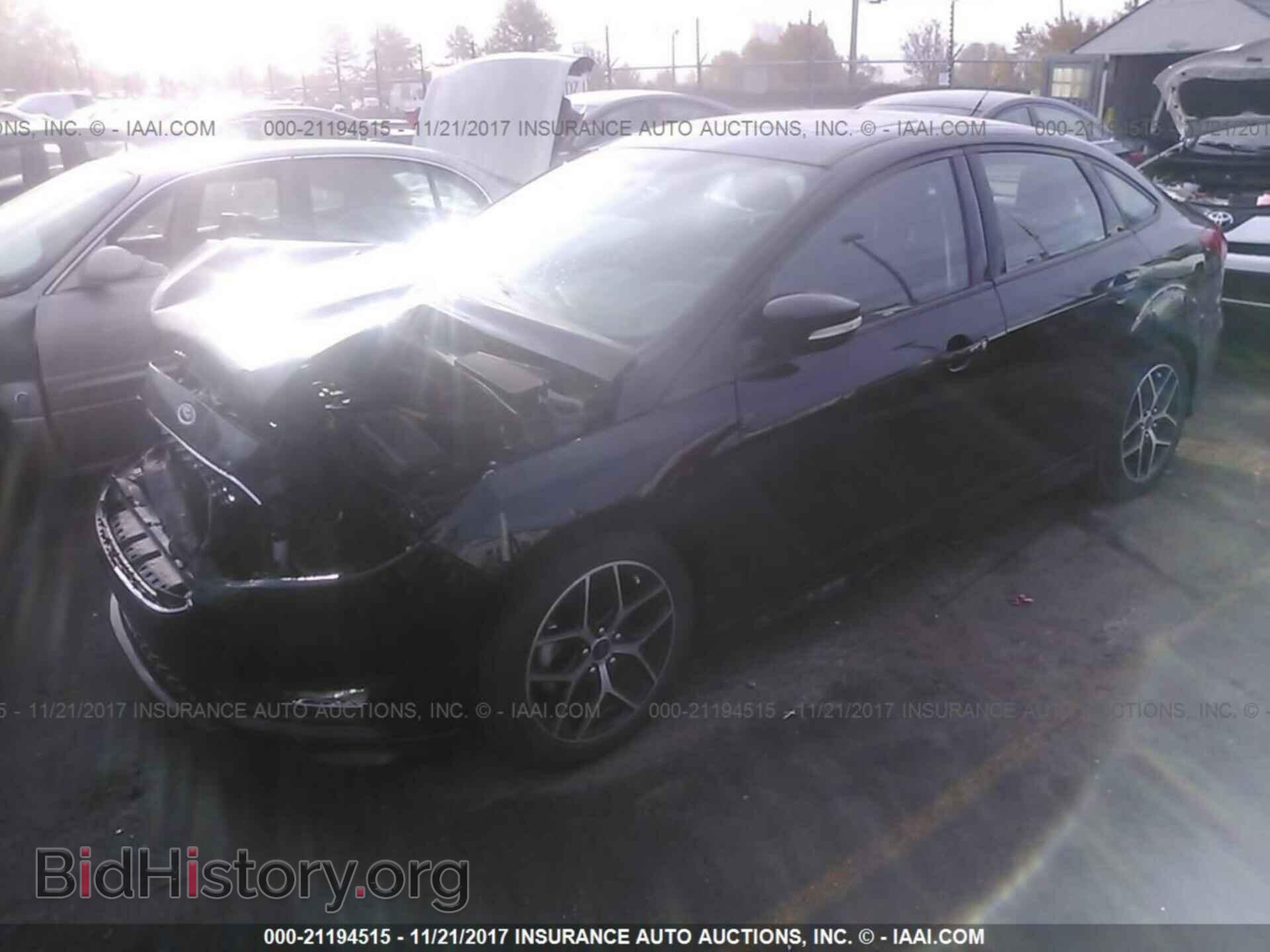 2016 Ford Focus - VIN: 1FADP3F26GL219244 - Photo 2