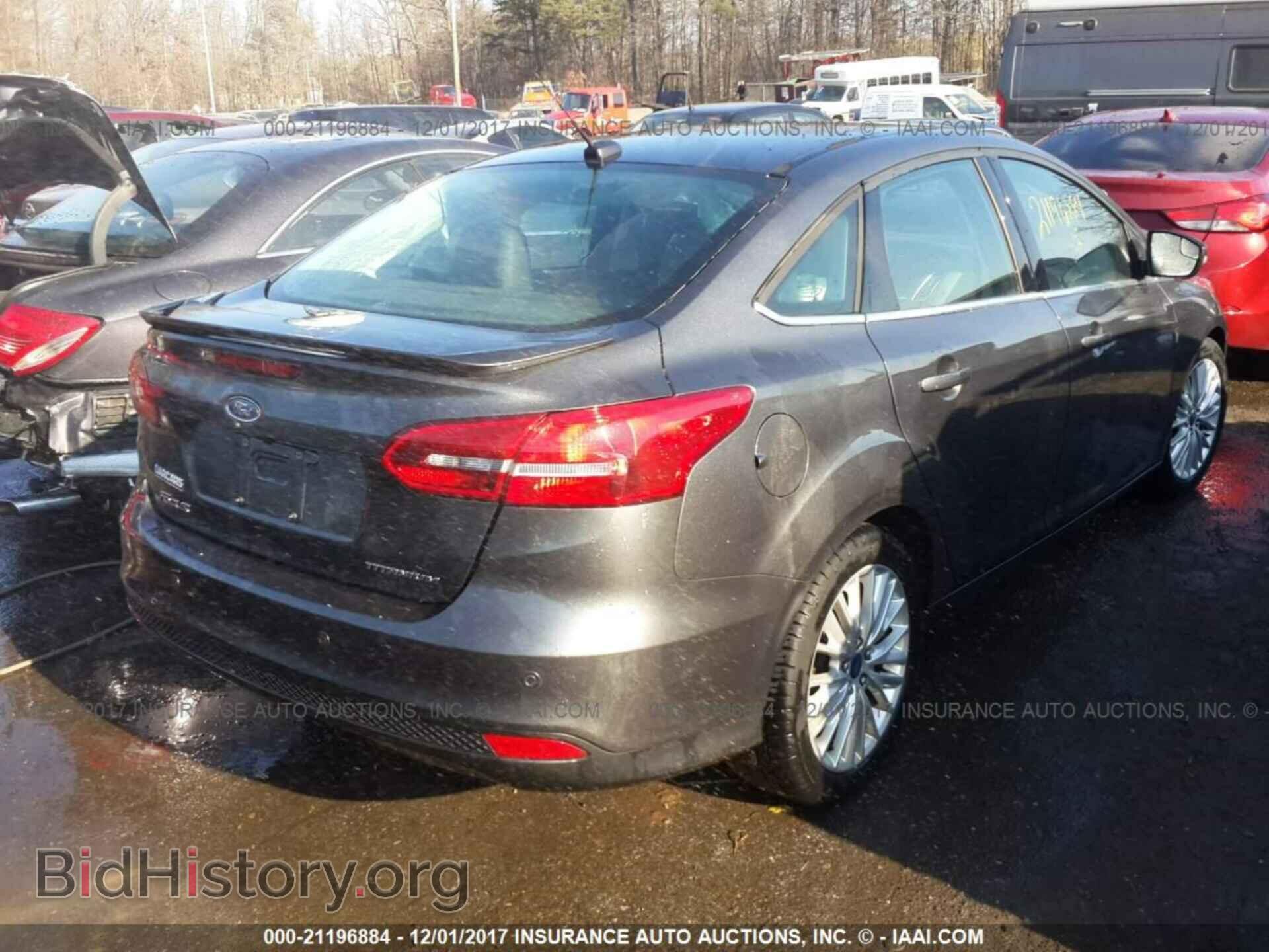 2015 Ford Focus - VIN: 1FADP3J26FL215829 - Photo 4
