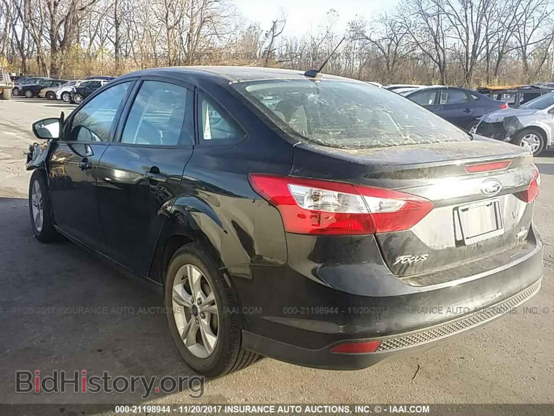 2014 Ford Focus - VIN: 1FADP3F25EL404138 - Фото 3
