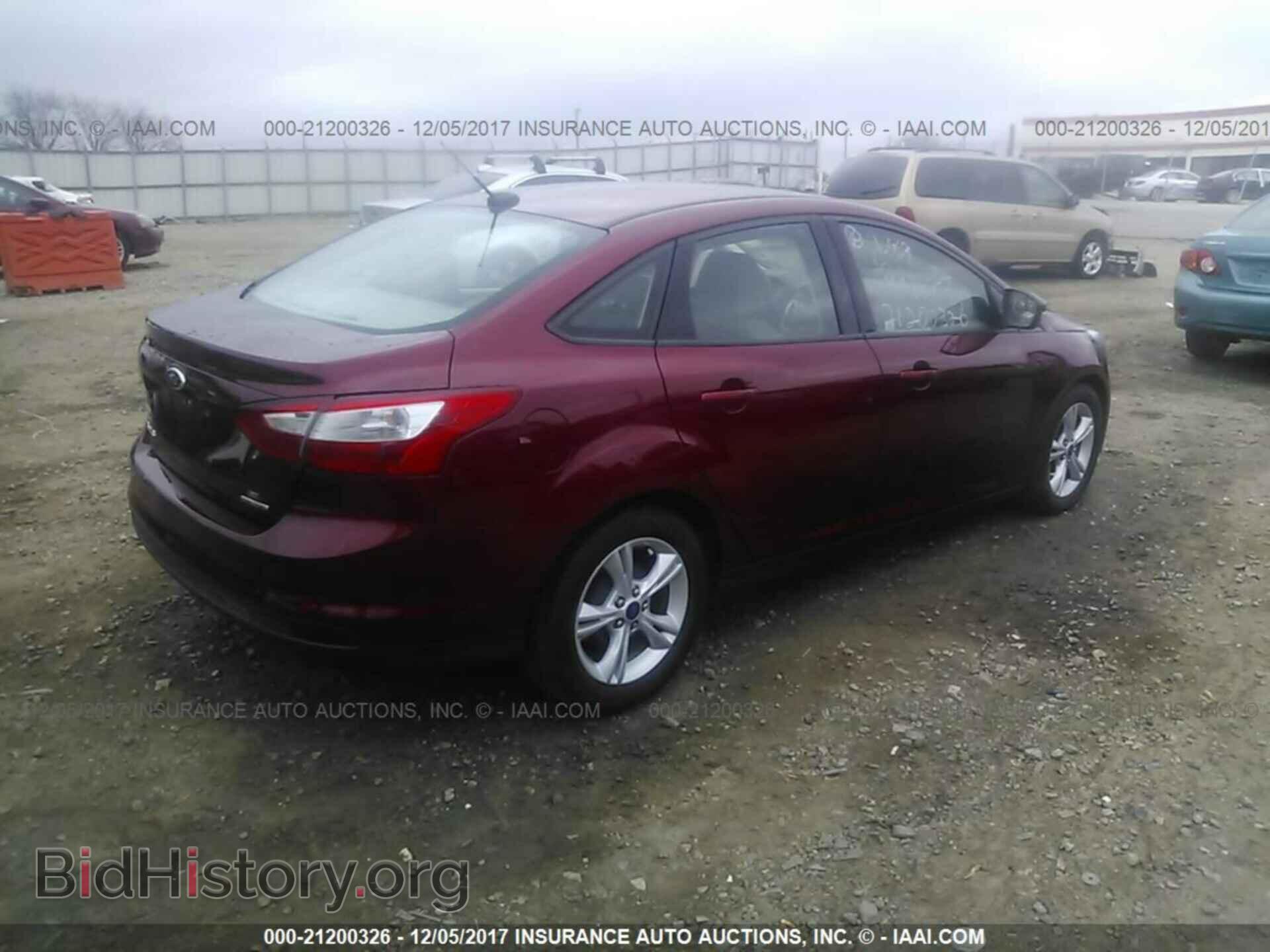 2014 Ford Focus - VIN: 1FADP3F20EL409683 - Фото 4