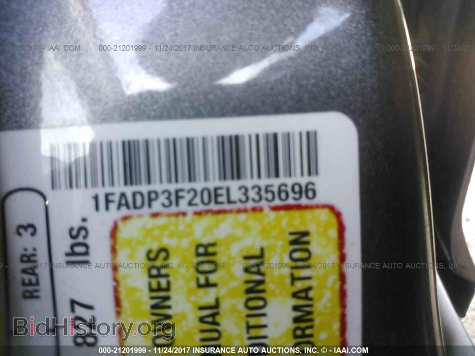2014 Ford Focus - VIN: 1FADP3F20EL335696 - Photo 9