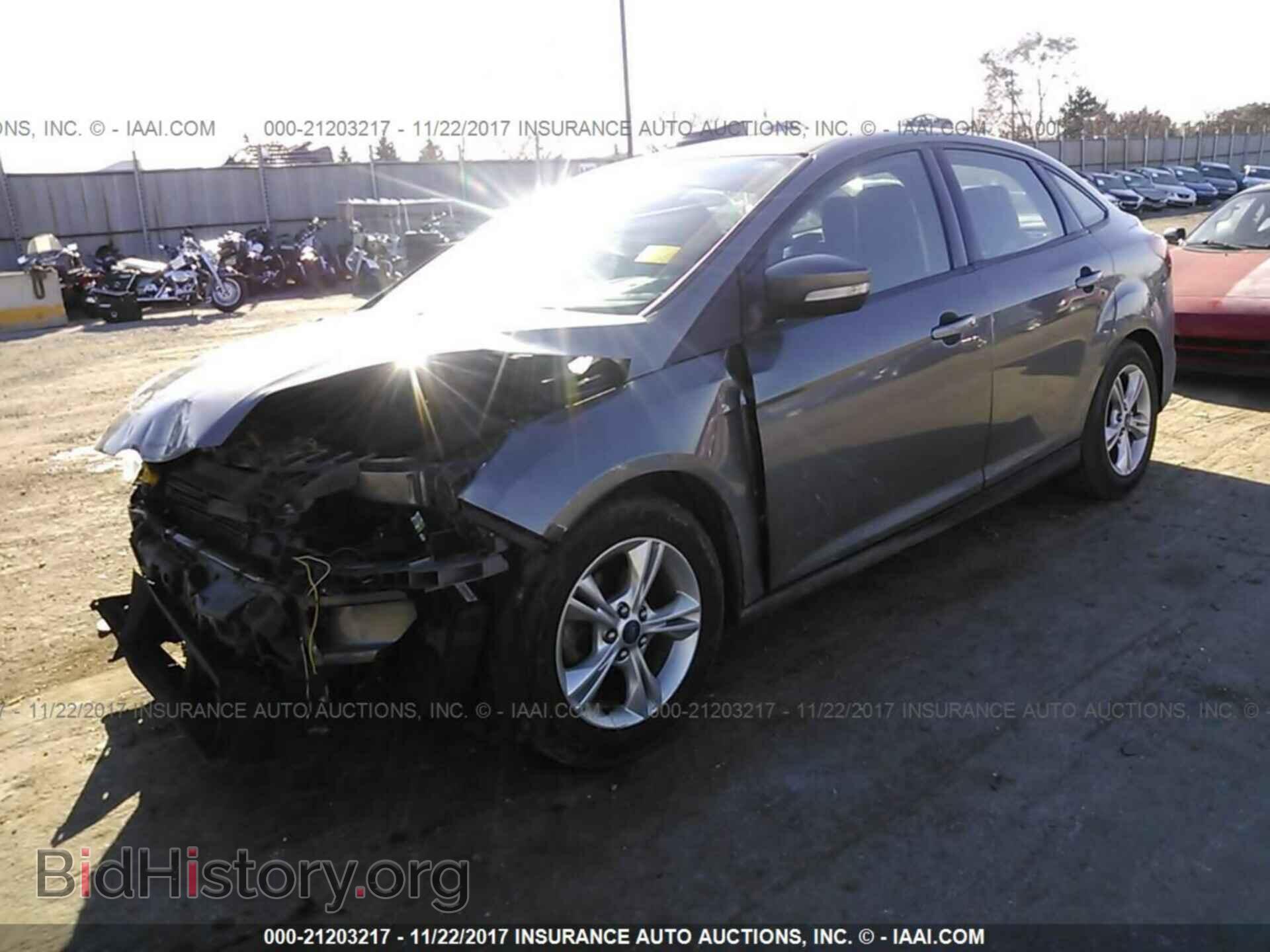 2014 Ford Focus - VIN: 1FADP3F29EL293075 - Фото 2