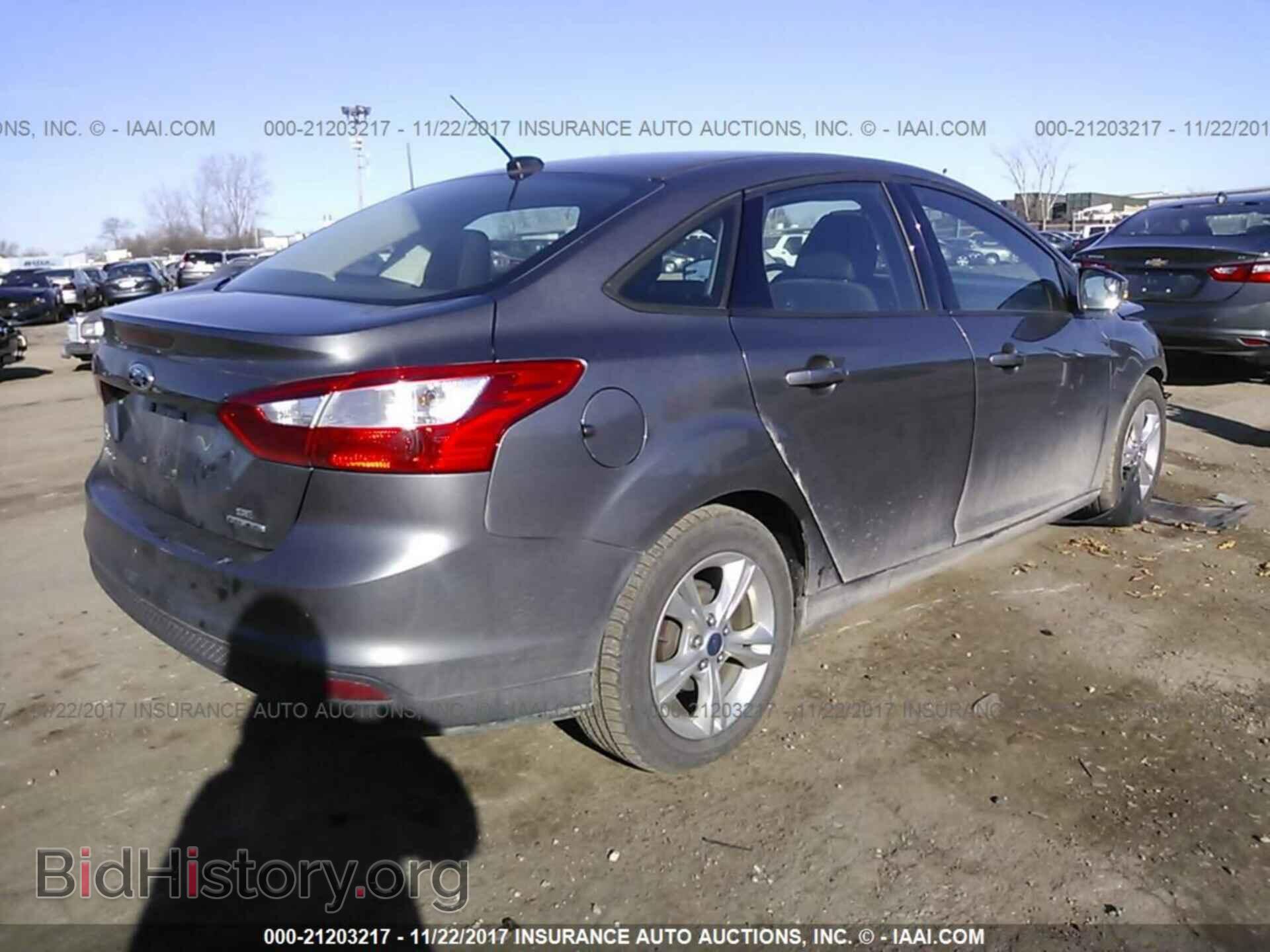 2014 Ford Focus - VIN: 1FADP3F29EL293075 - Фото 4