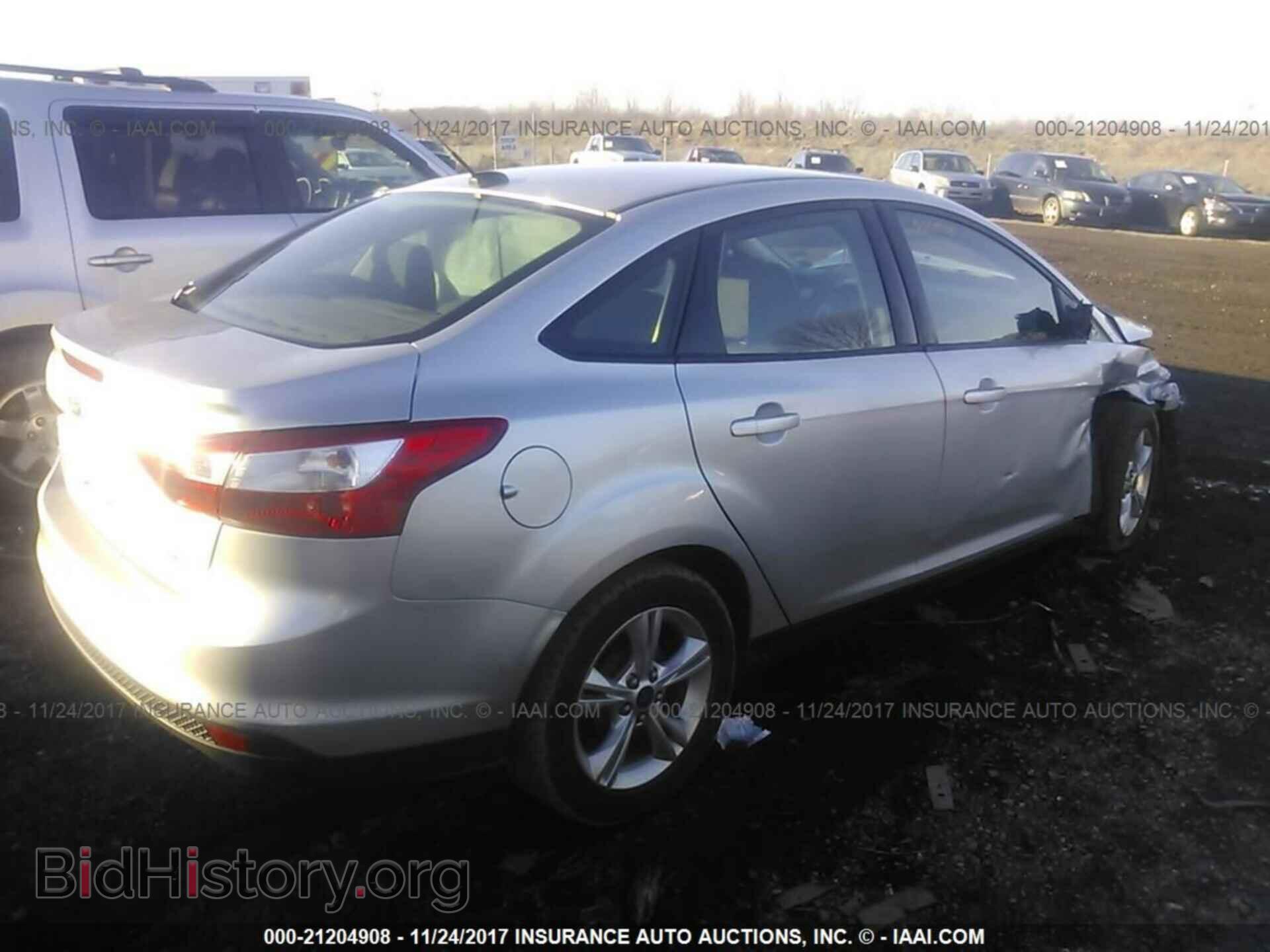 2013 Ford Focus - VIN: 1FADP3F25DL230098 - Фото 4