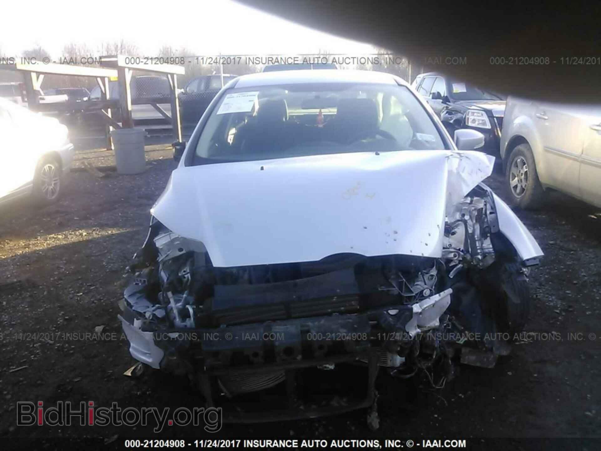 2013 Ford Focus - VIN: 1FADP3F25DL230098 - Фото 6