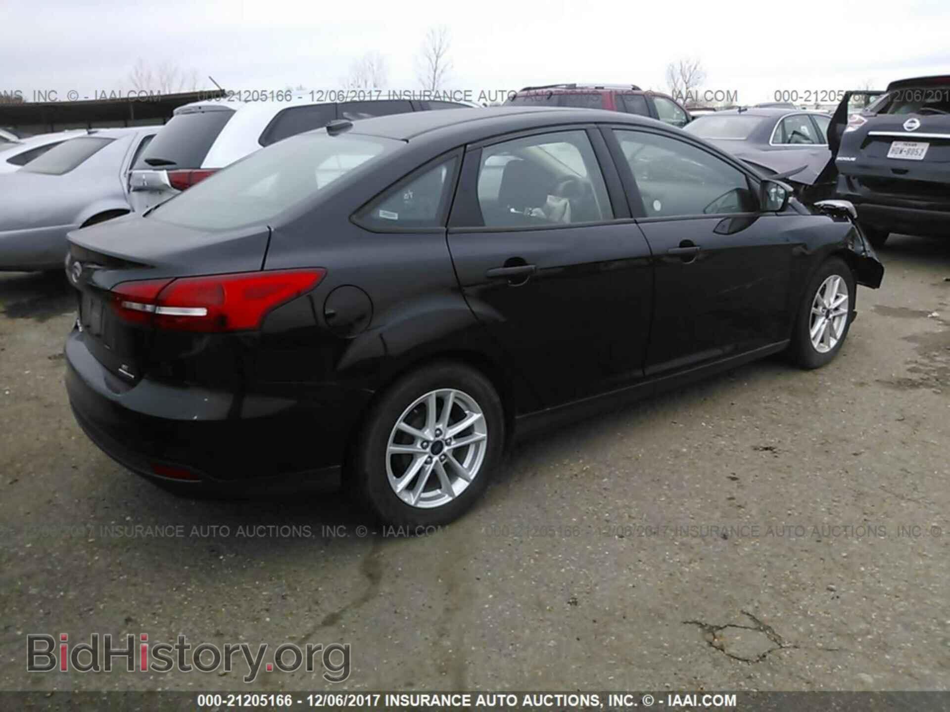 2016 Ford Focus - VIN: 1FADP3F27GL285706 - Фото 4