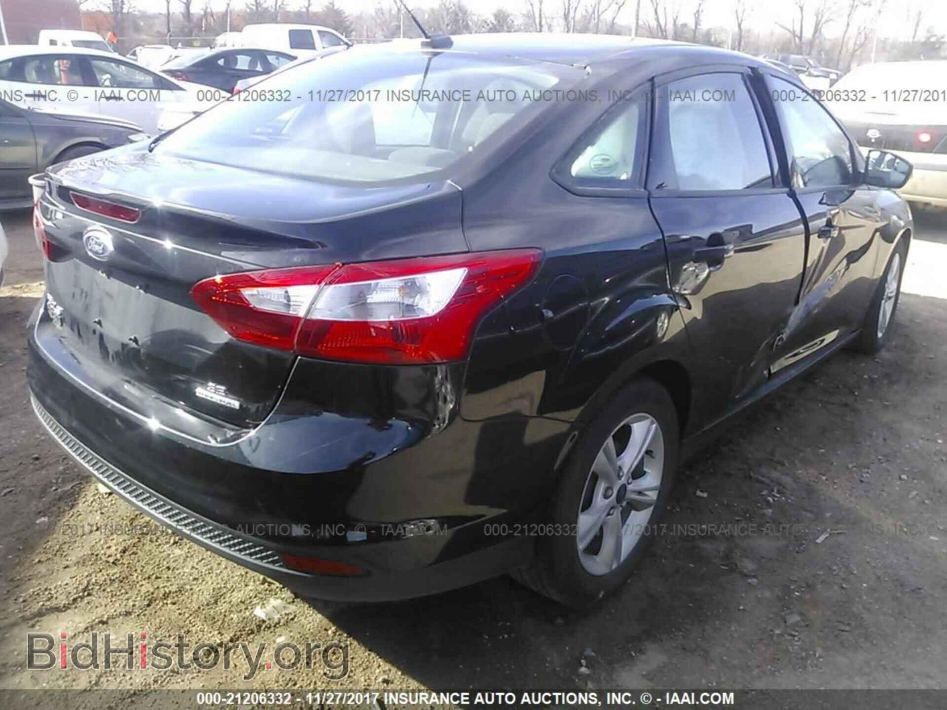 2014 Ford Focus - VIN: 1FADP3F21EL406792 - Photo 4