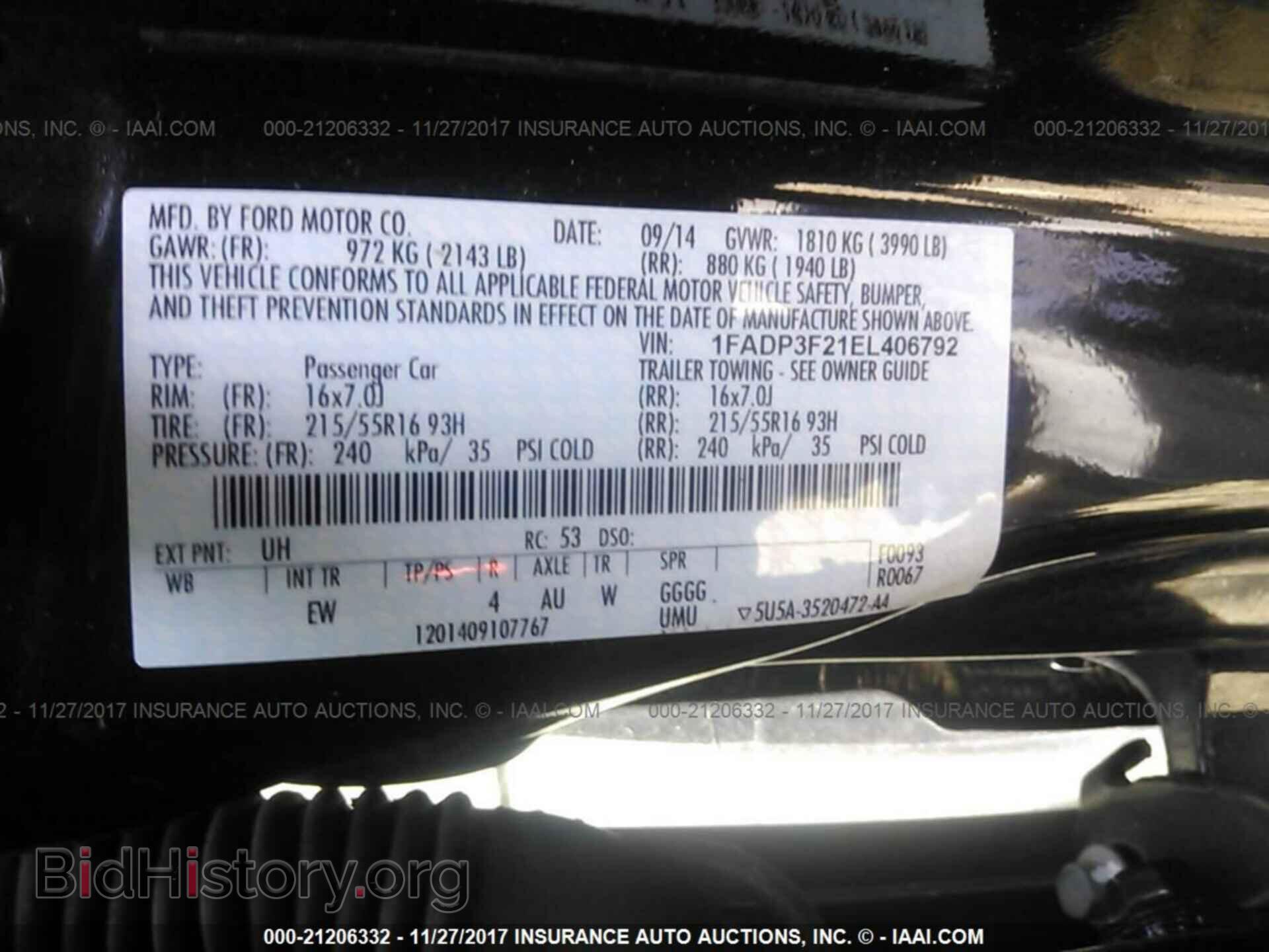 2014 Ford Focus - VIN: 1FADP3F21EL406792 - Photo 9