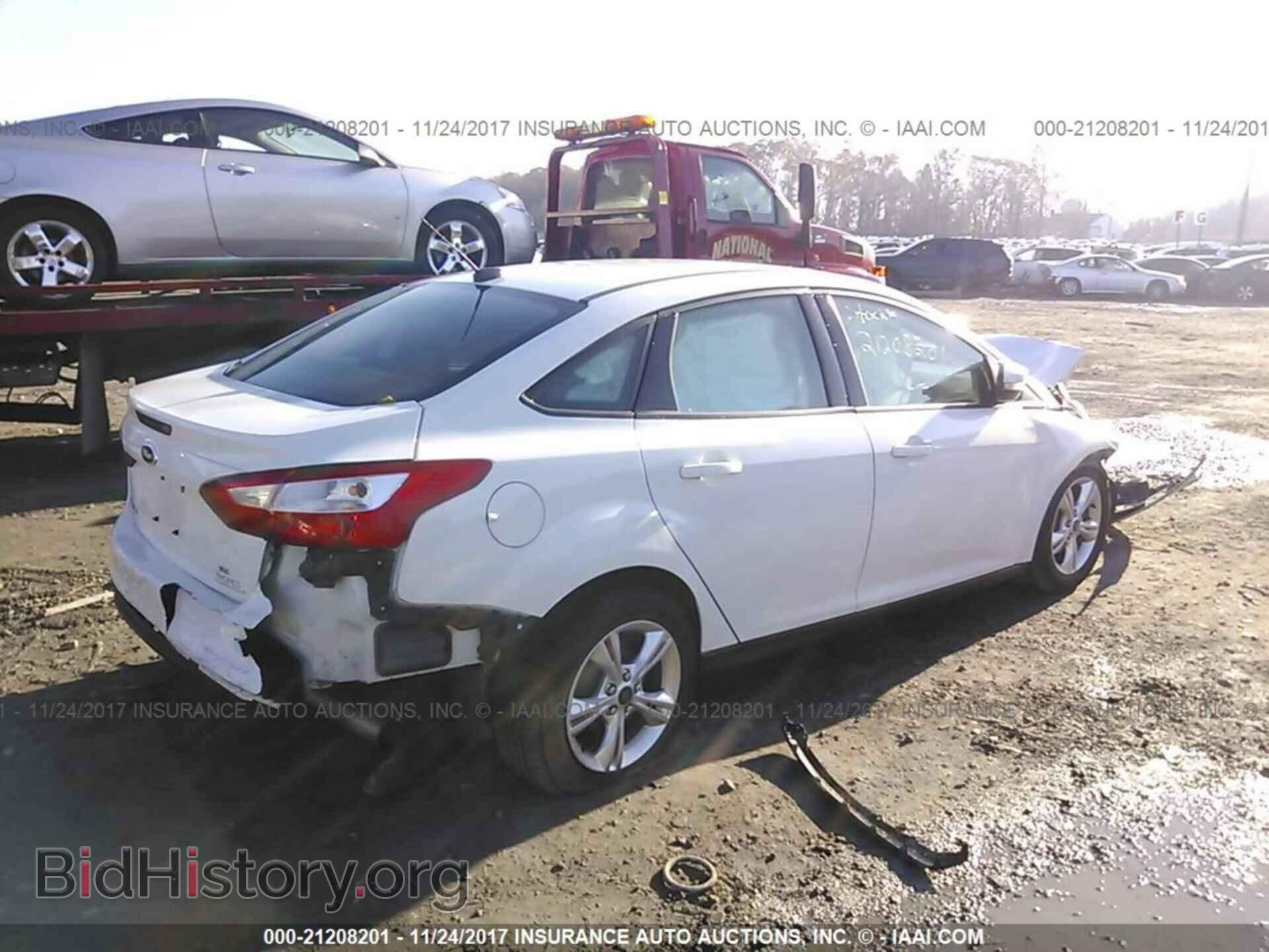 2013 Ford Focus - VIN: 1FADP3F25DL348670 - Photo 4