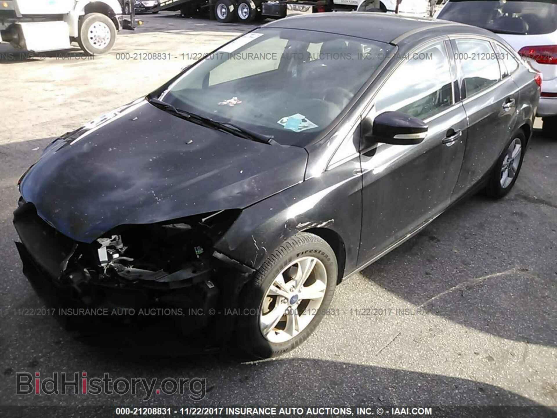 2014 Ford Focus - VIN: 1FADP3F27EL203714 - Фото 2